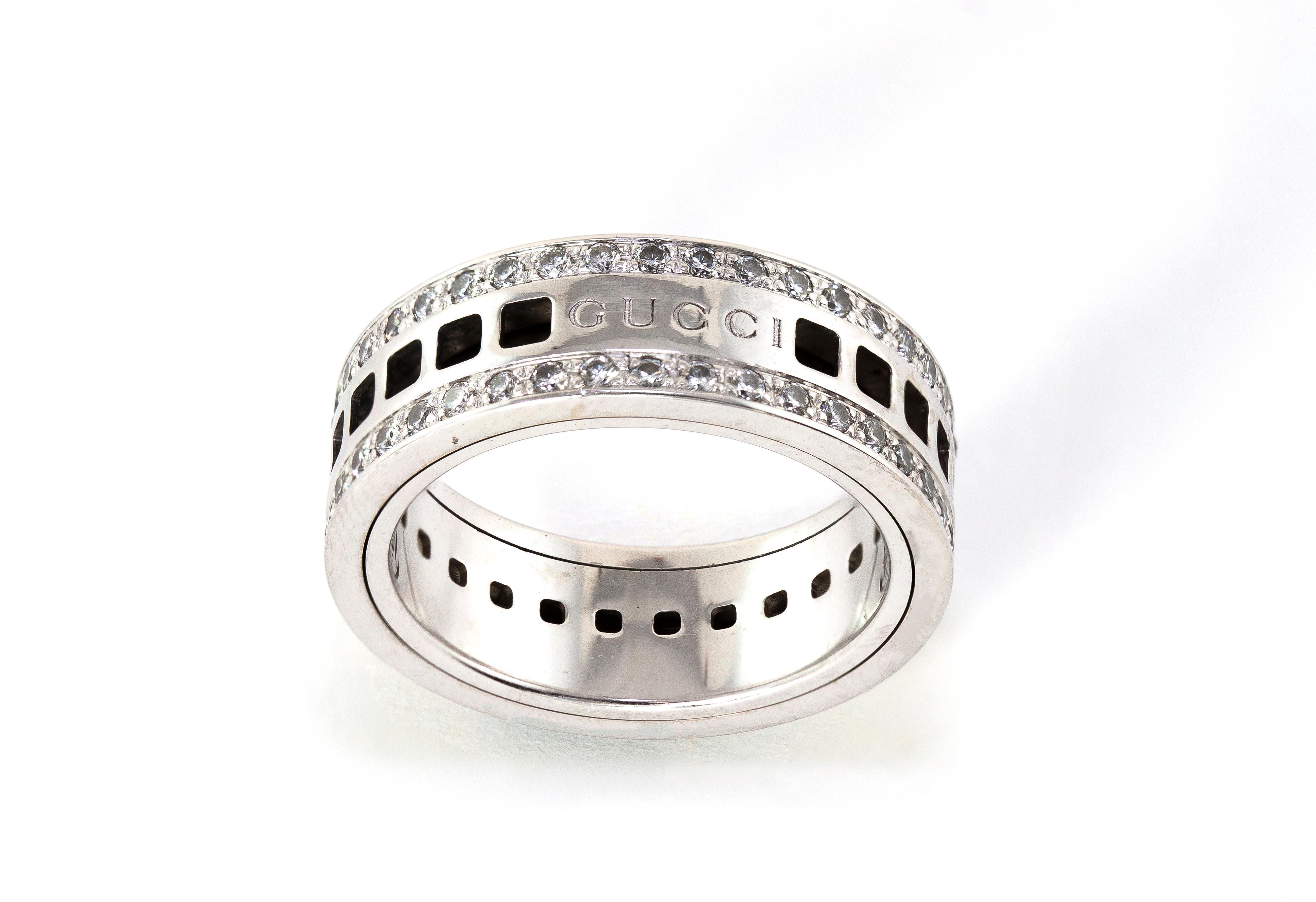 Gucci ring in 18 karat white gold. It has two rows of diamonds that total about 0.80 carats. The outer band spins on your finger. The inside of the ring is hallmarked Gucci, 750, made in Italy, and 17 for the Italian ring size.

UK Ring Size : P
US
