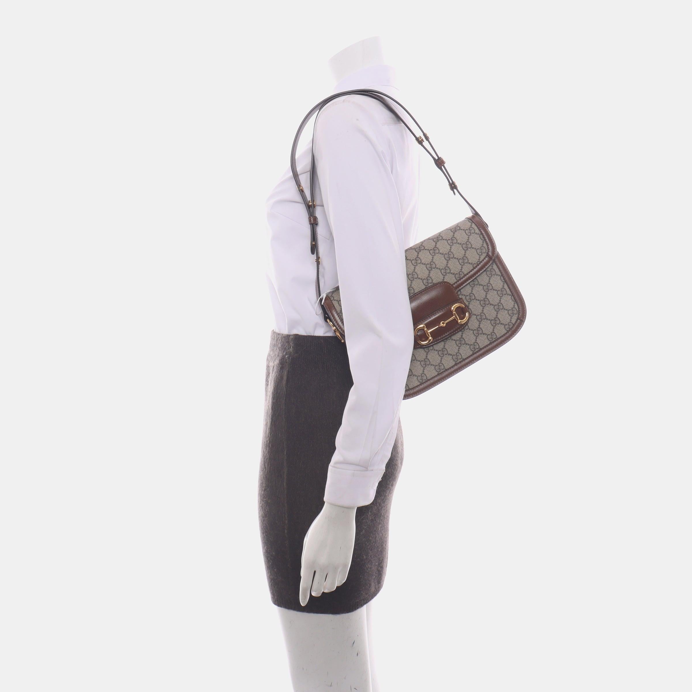 Gucci 1955 Horsebit Bag Tan Brown Small Leather Canvas Monogram
 These are professional photos of the actual bag offered
 Made from premium calfskin leather in a classic neutral caramel brown color, this Gucci Horsebit 1955 shoulder bag is a