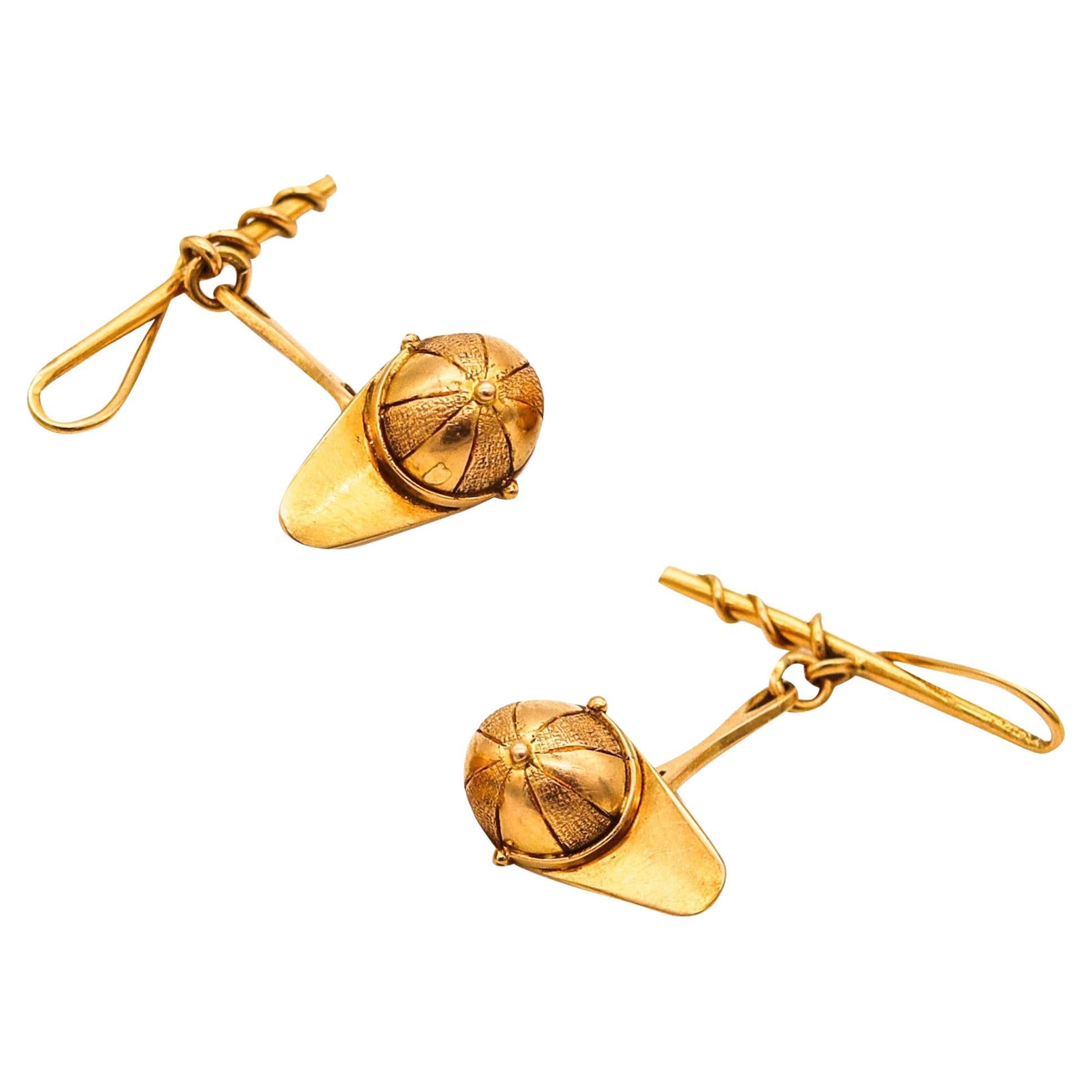 Gemelos GUCCI 1960 con motivos de jinetes y sombreros en oro amarillo macizo de 18 quilates