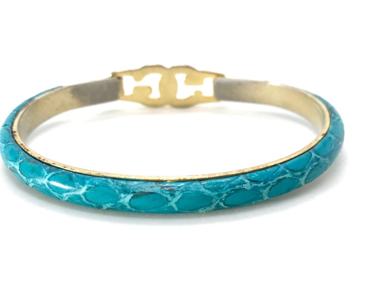 Gucci 1970s gold plated teal snakeskin leather bracelet. For Sale at
