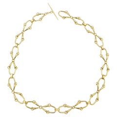 Vintage Gucci 1970s golden metal horsebit chain belt