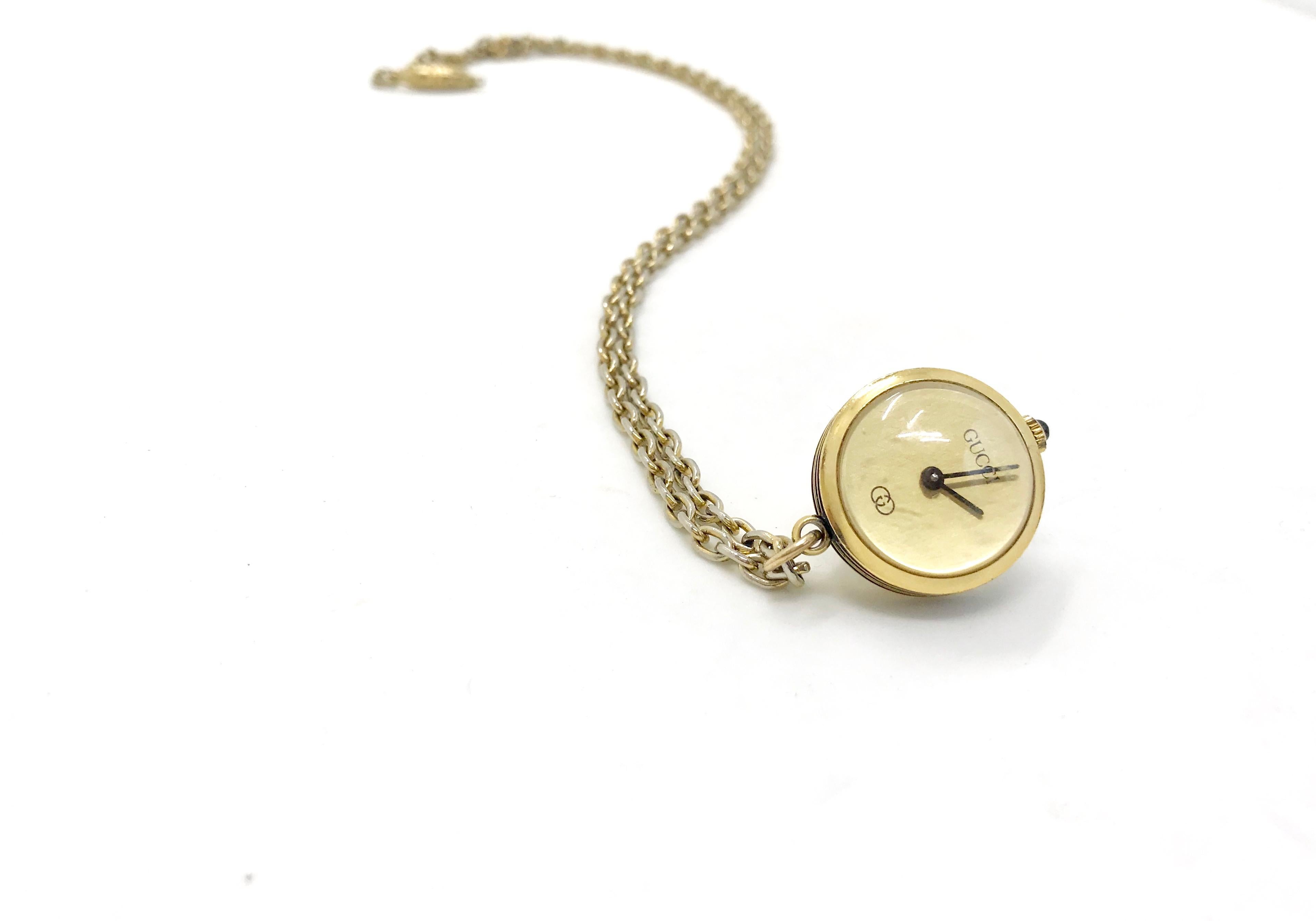Vintage 1970s Gucci watch pendant necklace. 
 
Rare and iconic piece from the Gucci archives.

Measuring around 3/4