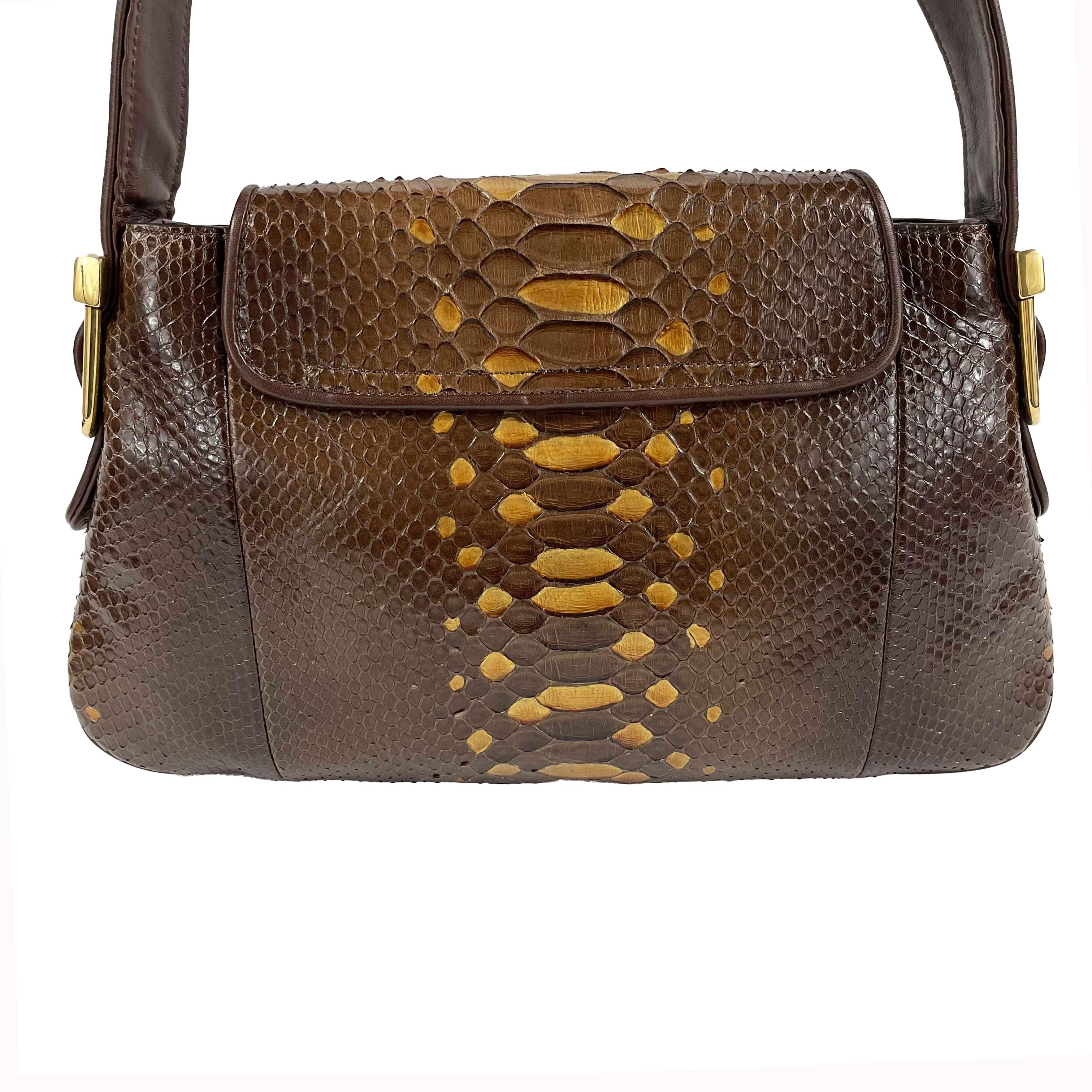 Gucci - Excellent - 1973 Python Metallic Accent  Shoulder - Brown - Handbag

Description

Fall Winter 2010 Collection.
Creative Director Frida Giannini sourced inspiration from the Gucci archives dating back to 1973 for the new impeccable and