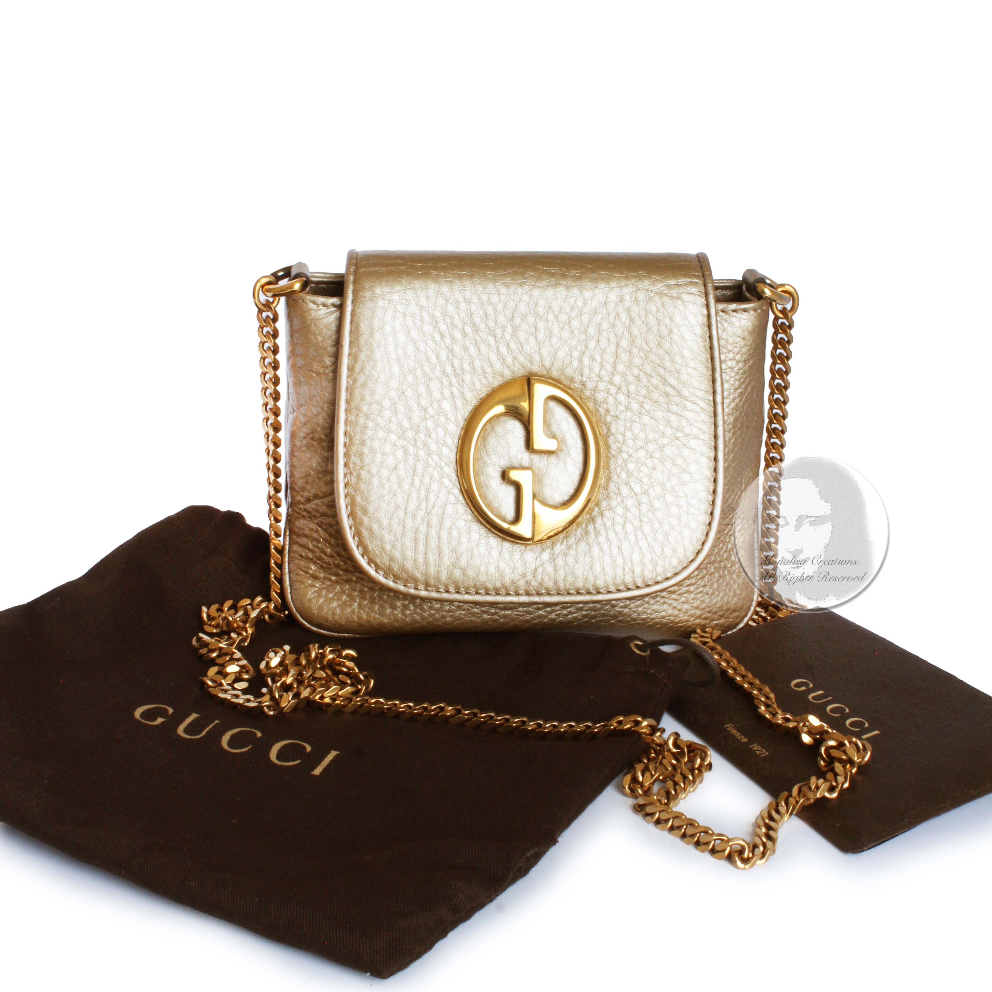 Authentic, New without Tag (NWOT) Gucci 1973 Shoulder Bag or Cross Body, released in 2012. Made from gold pebbled leather, it features the Gucci 1973 logo in gold on the top flap and has a gold metal chain strap. Lined in sueded fabric with one slip