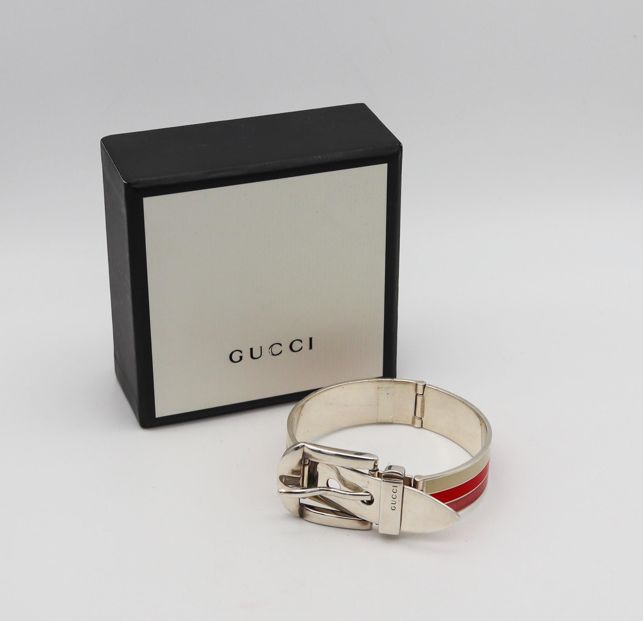 Enameled buckle bracelet designed by Gucci.

A rare vintage buckle bracelet, created in Florence Italy by the fashion house of Gucci, back in the 1980. This iconic bracelet was crafted in the shape of a belt buckle in solid .925/.999 sterling silver
