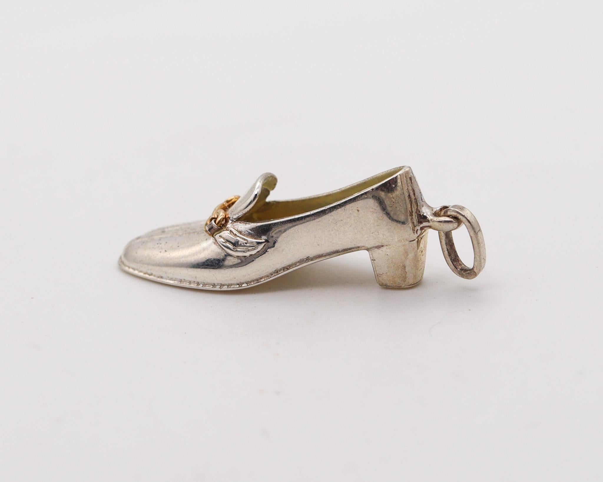 Pendant charm designed by Gucci.

Beautiful pendant-charm, created in Firenze Italy by the fashion house of Gucci, back in the 1980's. This pendant has been made as a miniature in the shape of the iconic Shoe With Heels in solid .925/.999 sterling