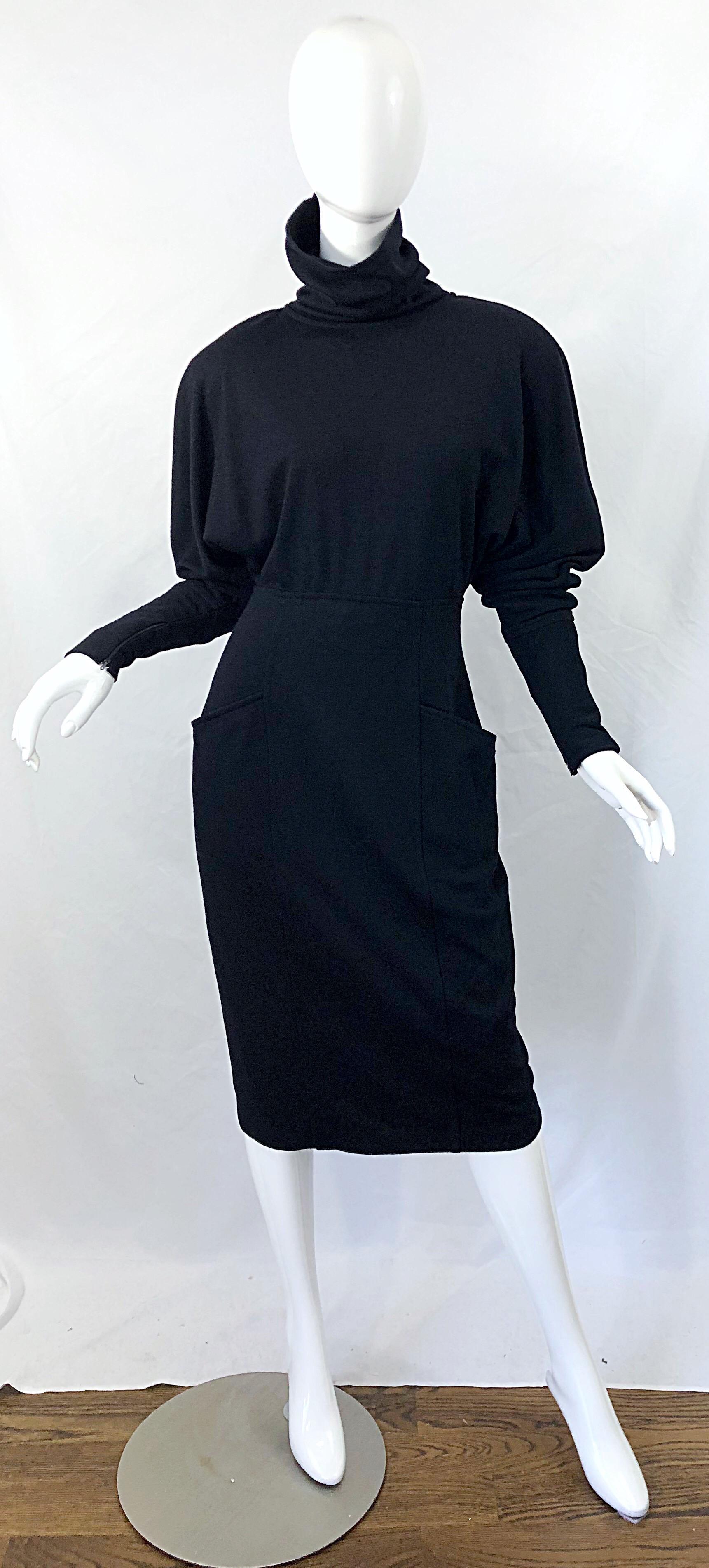 Avant Garde GUCCI 1980s black wool turtleneck dolman sleeve wool sweater dress ! Features the softest wool, with buttons up the back bodice, and zipper up the back skirt. Two pockets at each side of the hips. Can be worn so many different ways -
