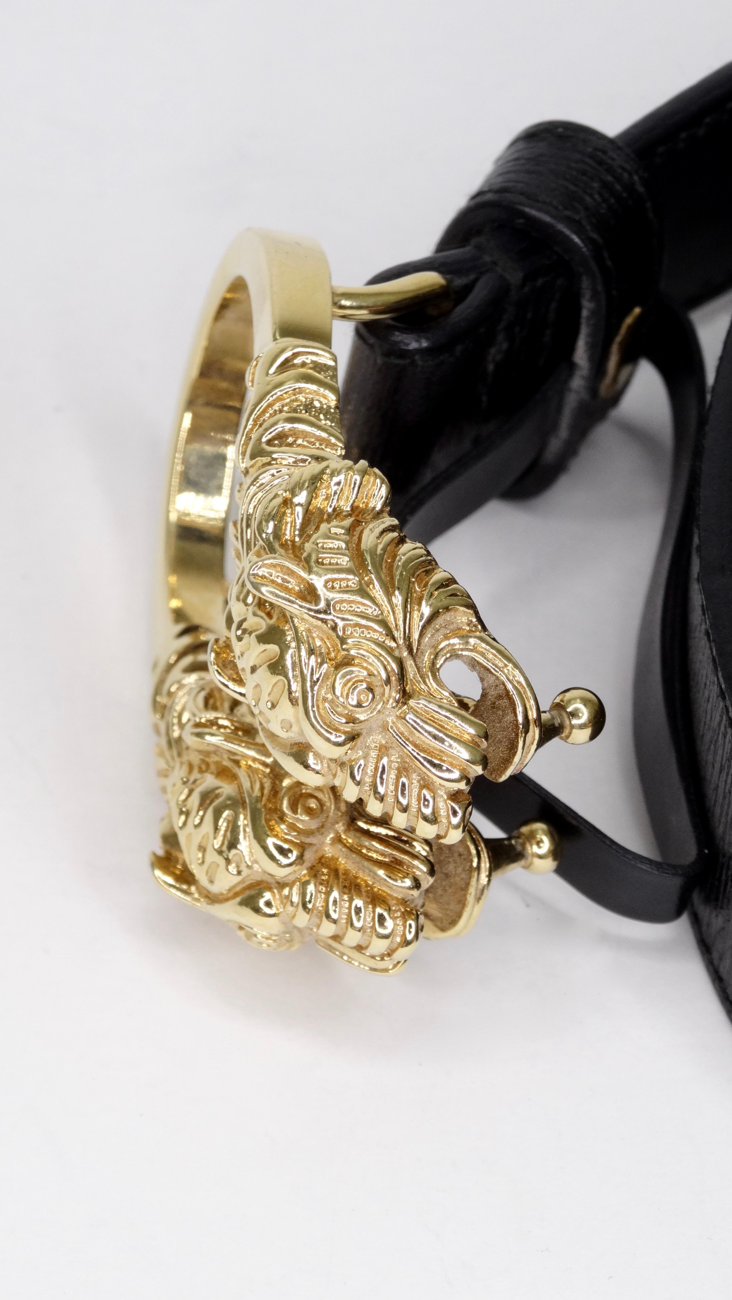 Score yourself a piece of classic Gucci with this amazing belt! Circa 1980s, this black leather belt features a Dionysus antiqued gold buckle-a unique detail referencing the Greek god Dionysus, who in myth is said to have crossed the river Tigris on