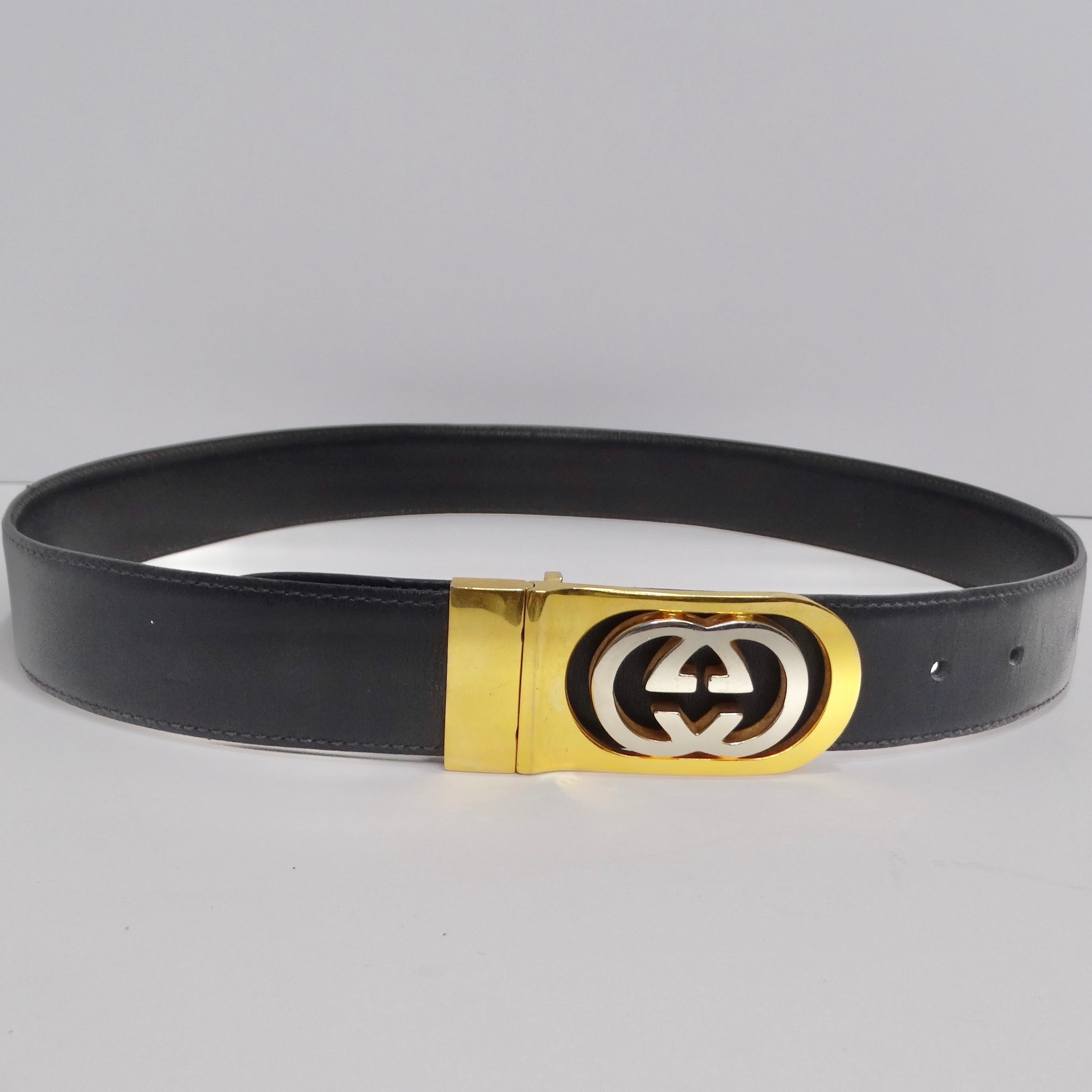 Elevate your style with a touch of vintage glamour courtesy of this Gucci masterpiece. This classic black leather belt is a testament to timeless fashion. Its centerpiece is the signature Gucci logo belt buckle, rendered in striking silver and gold