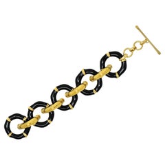 Gucci, bracelet à maillons vintage en or jaune 18 carats, émail et bambou, années 2000