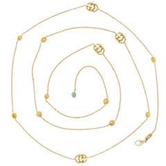 Gucci 2000's Topaz 18 Karat Yellow Gold GG Running Station Chain Necklace