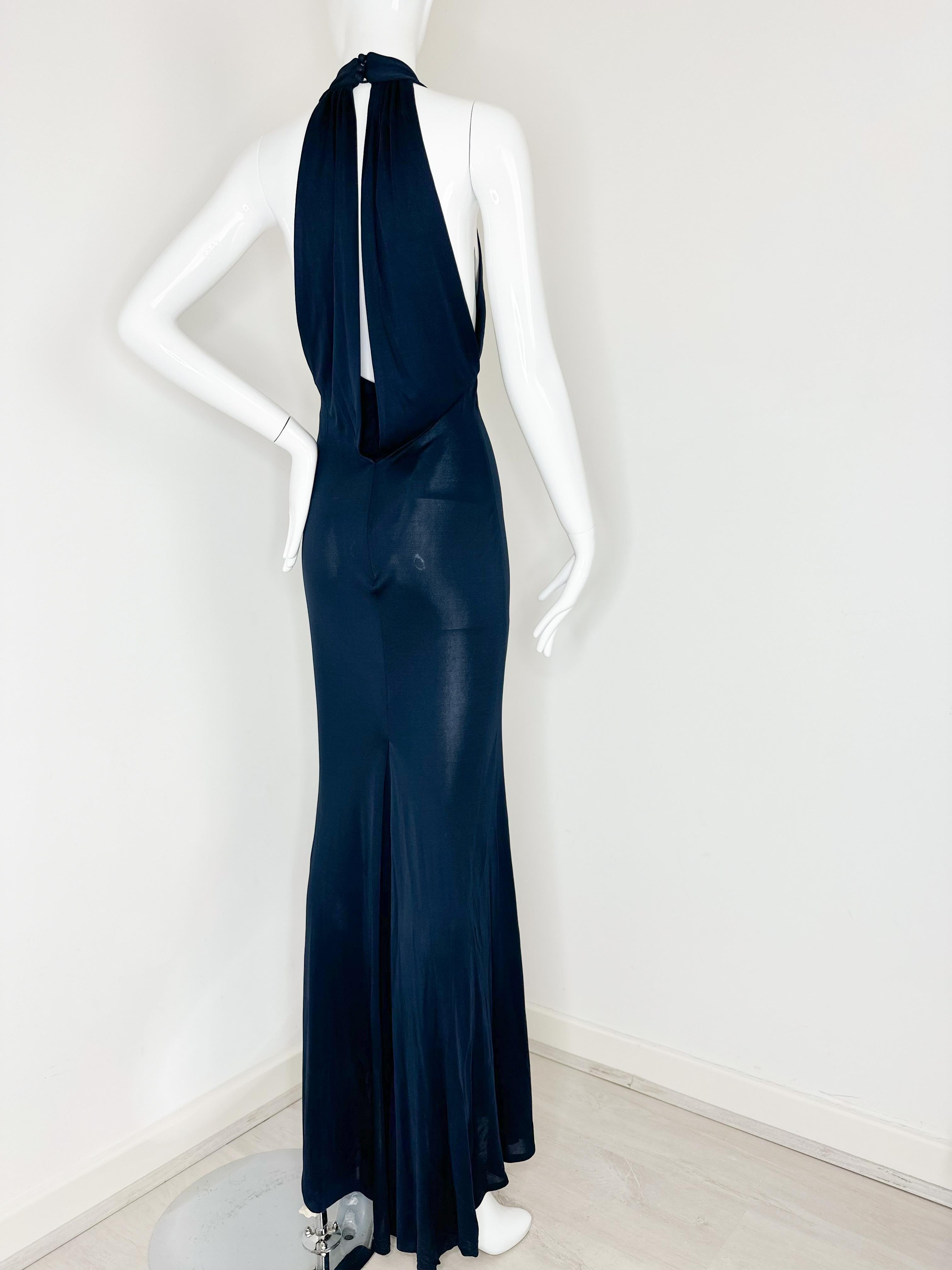 Gucci 2006 navy gown with crystal GG embellishments 
Zipper in the back 
Size 40

Brand new with original tags!