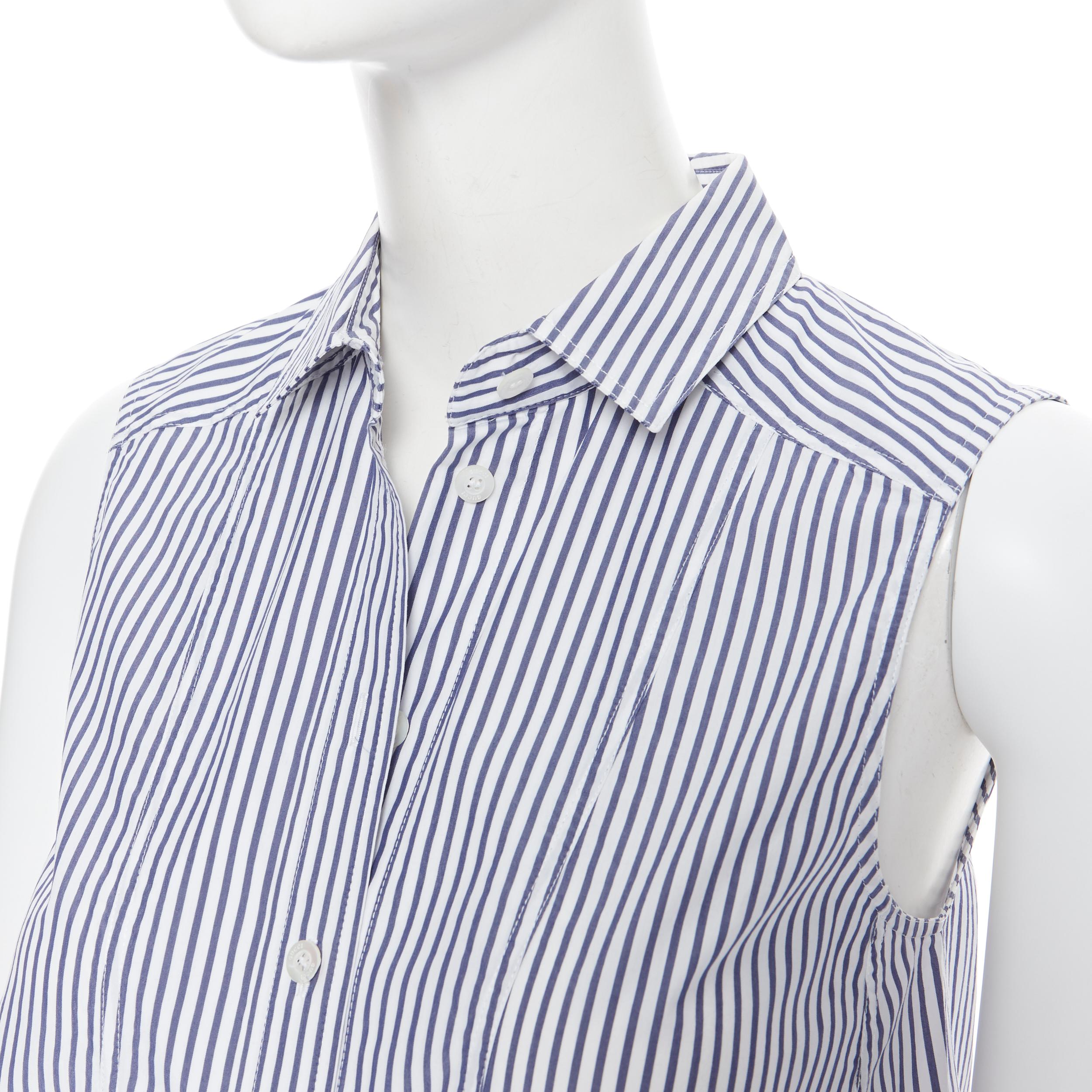GUCCI 2009 cotton blend blue white stripe button down casual dress IT36 XS
Brand: Gucci
Model Name / Style: Shirt dress
Material: Cotton blend
Color: Navy, white
Pattern: Striped
Extra Detail: Button tab at lining to cinch at waist. Sleeveless.