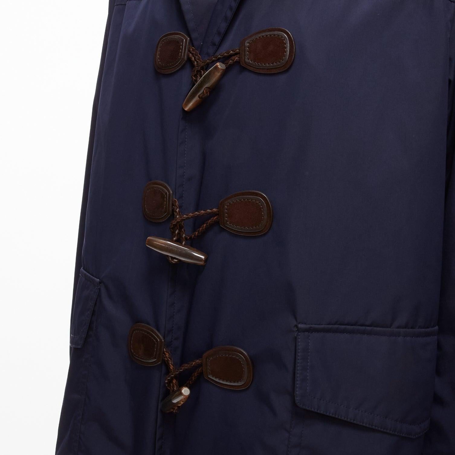 GUCCI 2012 navy nylon brown toggle hooded anorak jacket coat IT48 M
Reference: JSLE/A00022
Brand: Gucci
Collection: 2012
Material: Nylon, Leather
Color: Navy, Brown
Pattern: Solid
Closure: Button
Lining: Black Fabric
Made in:
