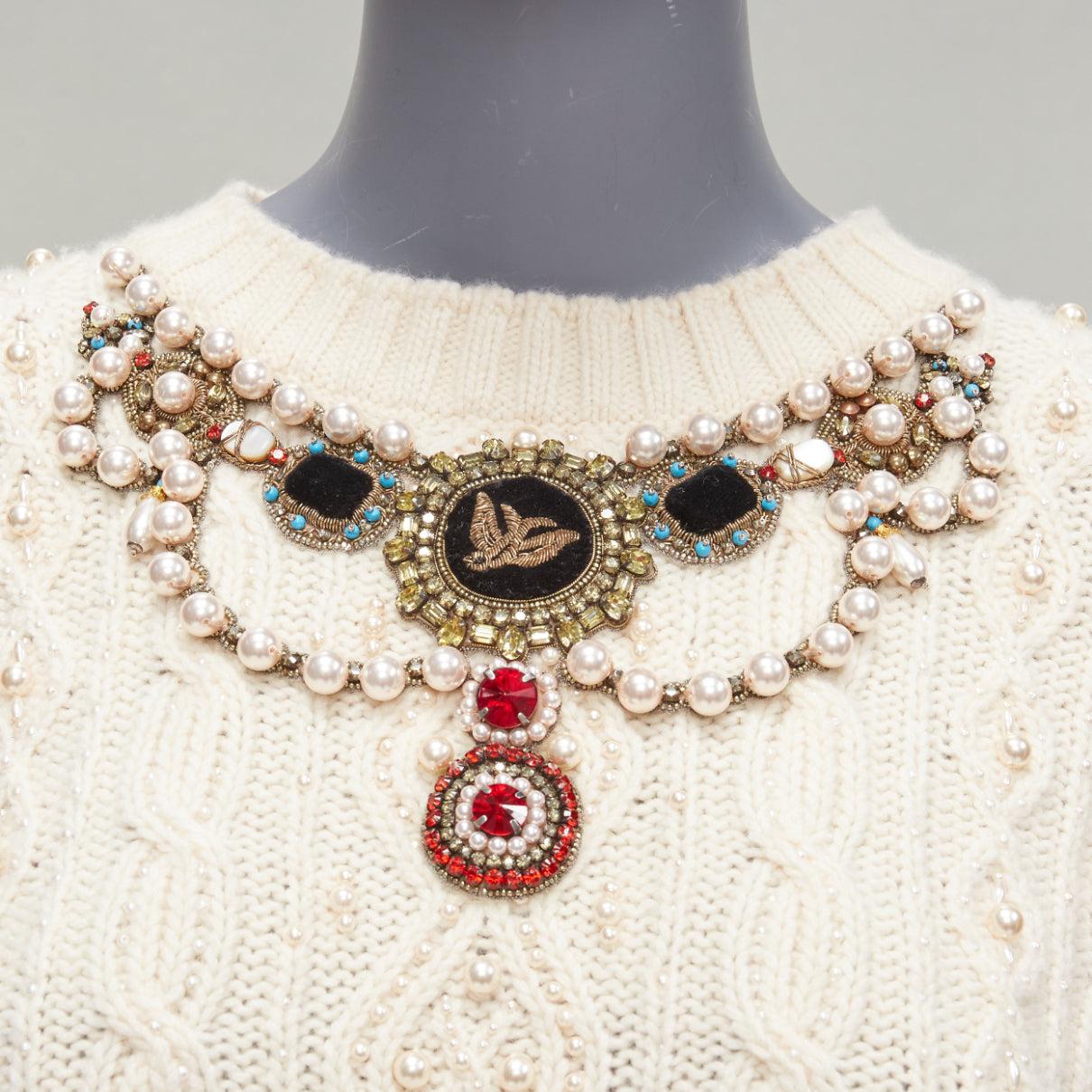 GUCCI 2016 cream wool cashmere faux pearl necklace embellished cable sweater S
Reference: VACN/A00048
Brand: Gucci
Designer: Alessandro Michele
Collection: 2016
Material: Wool, Cashmere
Color: Beige
Pattern: Solid
Closure: Slip On
Extra Details: