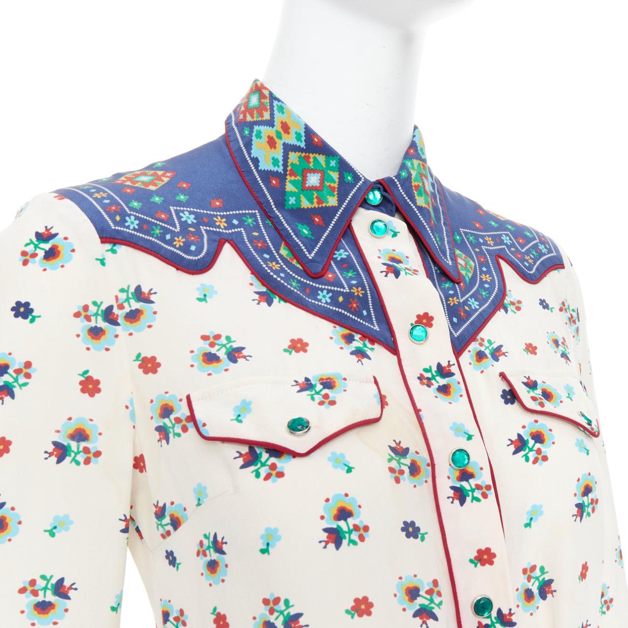GUCCI 2016 navy cream 100% silk western print belted dress IT38 XS
Reference: GEGG/A00165
Brand: Gucci
Designer: Alessandro Michele
Collection: 2016
Material: Silk
Color: Cream, Navy
Pattern: Floral
Closure: Snap Buttons
Extra Details: Green resin