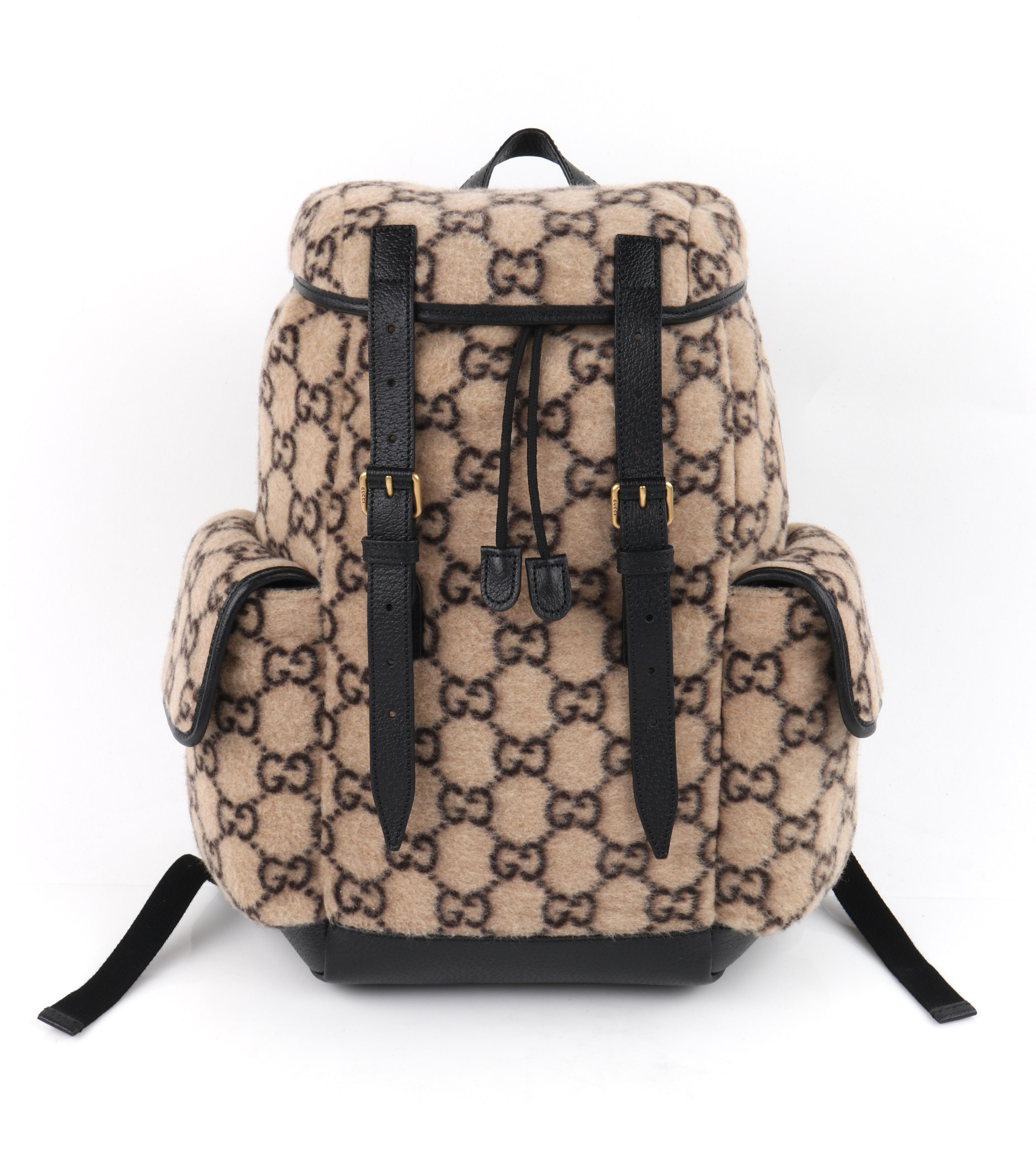 Brand / Manufacturer: Gucci
Collection: 2019
Designer: Alessandro Michele
Style: Backpack
Color(s): Shades of brown, beige, black, gold
Lined: Yes 
Unmarked Fabric Content (feel of): Wool (primary material), leather (trim, bottom, straps), metal