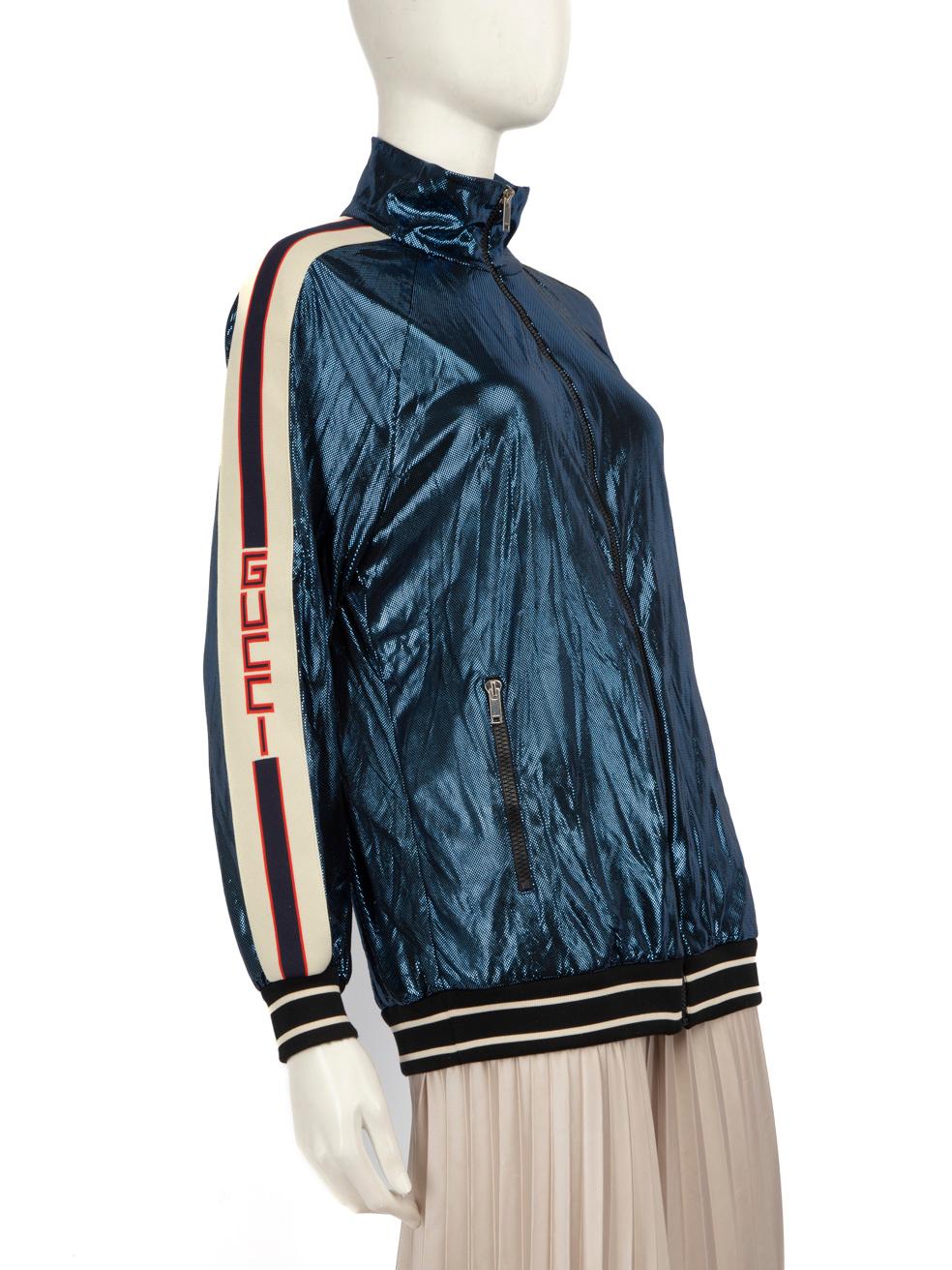 CONDITION is Very Good. Hardly any visible wear to the jacket is evident on this used Gucci designer resale item.

Details


2019 Sylvie Web Accent Windbreaker

Blue

Synthetic

Windbreaker jacket

Metallic finish

2x Zipped pockets

Web