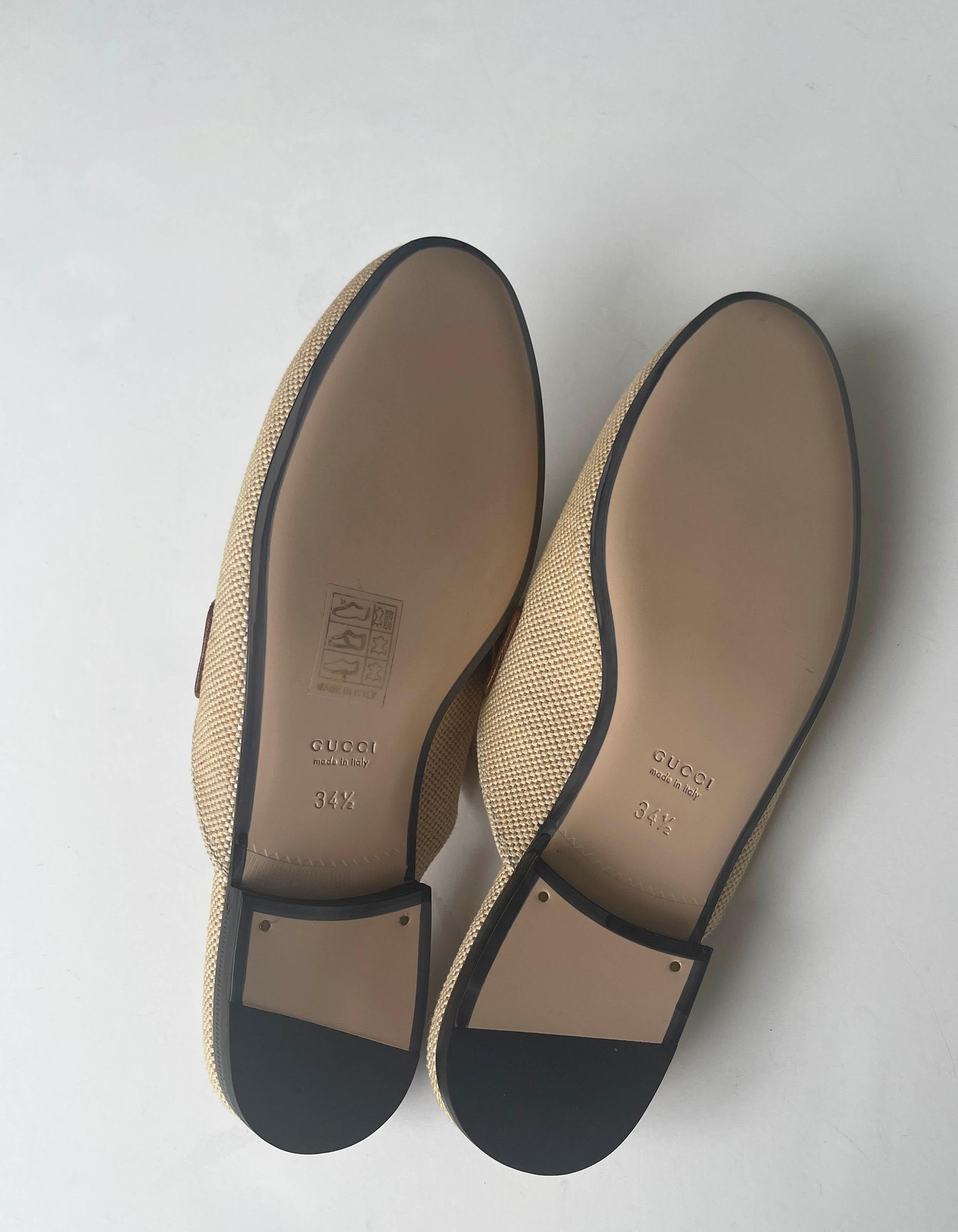 Gucci 2019 NEW Beige Princetown Flat Canvas Bit Mules sz 34.5. Features red and green web and leather trim

Made In: Italy
Year of Production: 2019
Color: Beige with red and green
Hardware: Goldtone
Materials: Canvas, leather, metal
Closure/Opening: