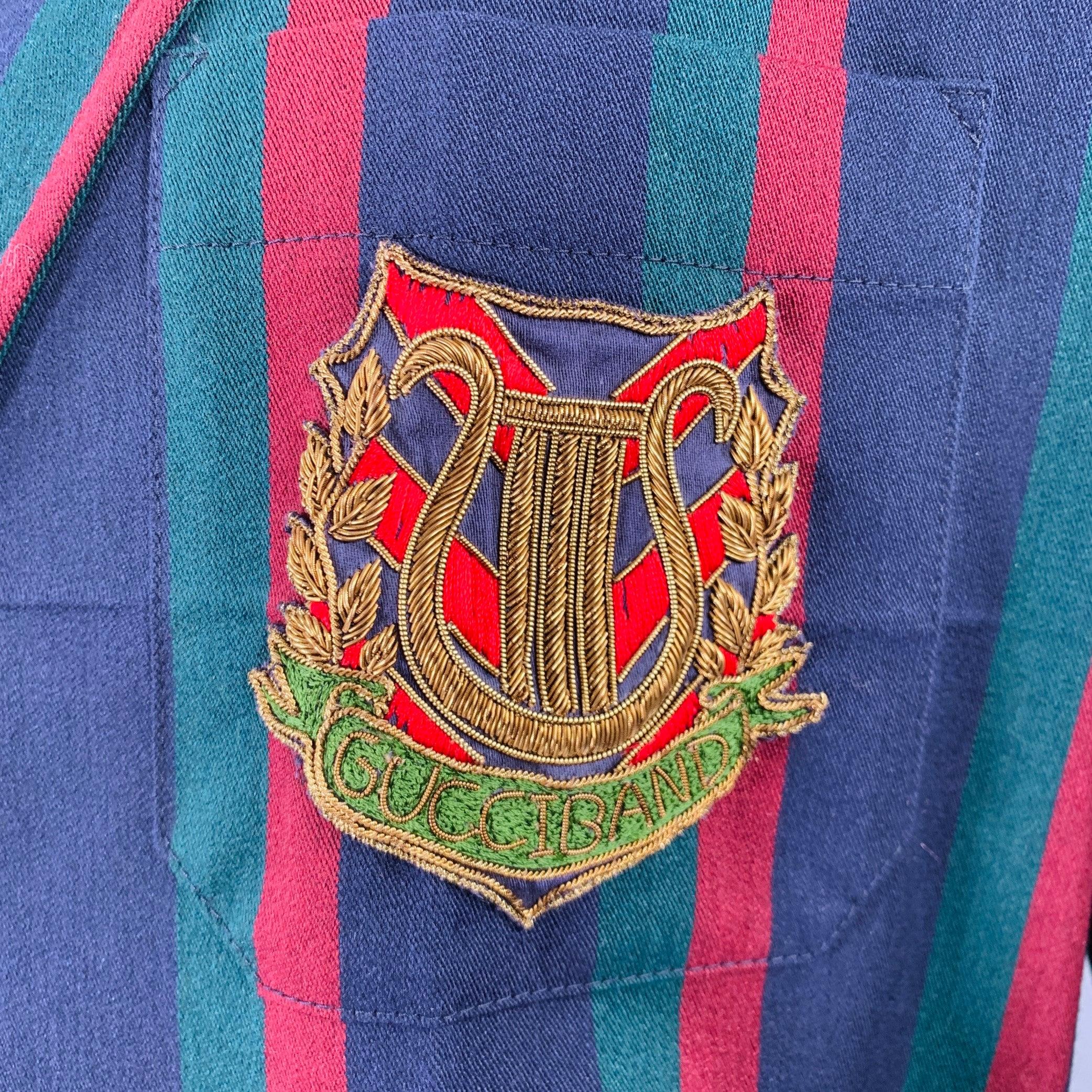 Cappotto 2019 di Gucci by Alessandro Michele
in lana nera e bordeaux con stile sovrapposto, applicazione 