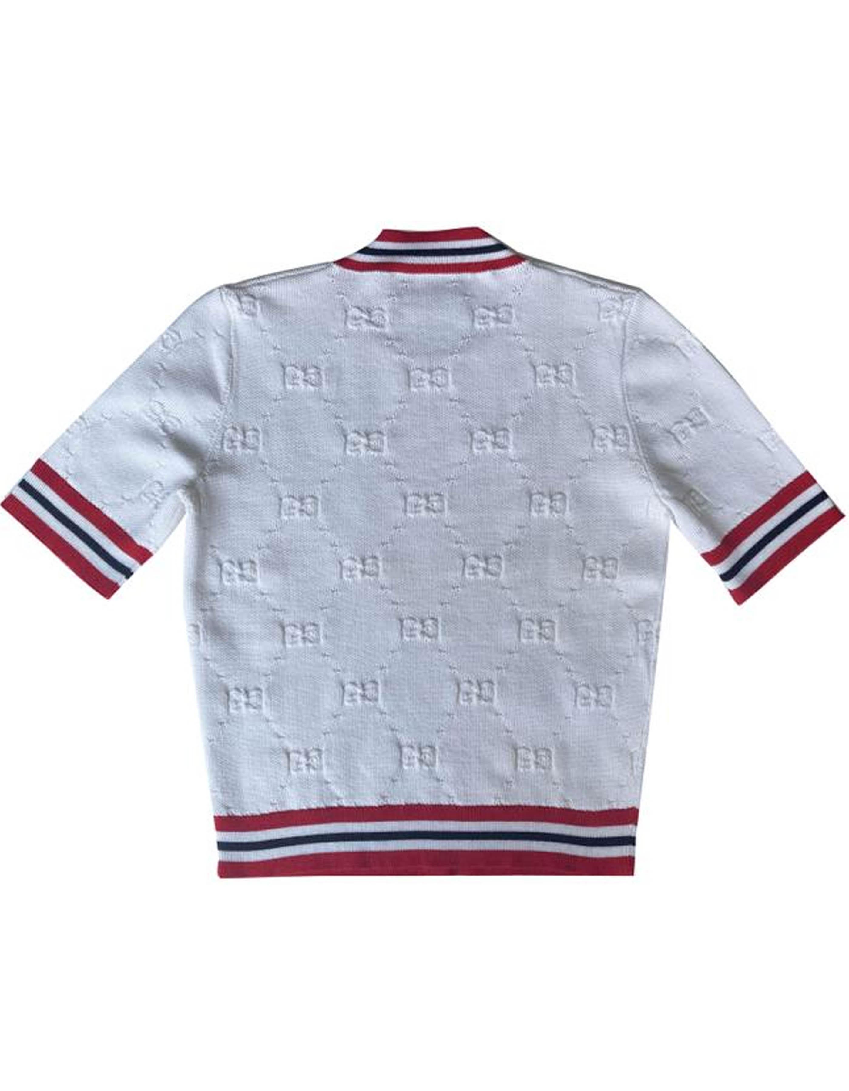 Gucci White GG Monogram Short-Sleeved Wool Blend Sweater sz XS. From the Fall/Winter 2019 Collection by Alessandro Michele

Made In: Italy
Year of Production: 2019
Color: White with red and navy Sylvie web trim
Materials: 69% wool, 29% silk, 1%