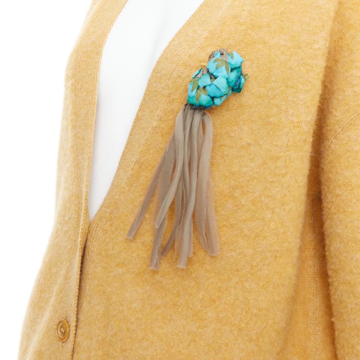 GUCCI 2020 100% wool yellow blue floral brooch oversized cardigan M
Reference: JACG/A00260
Brand: Gucci
Designer: Alessandro Michele
Collection: 2020
Material: Wool, Cotton
Color: Yellow, Green
Pattern: Floral
Closure: Button
Extra Details: Cotton