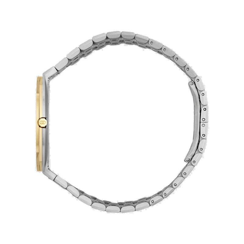 34mm stainless steel and 18k yellow gold plated multi-layered case, golden brass dial with Interlocking G motif, five link stainless steel bracelet
3 ATM (30 meters/98 feet)
Sapphire glass with antireflective coating
Quartz movement
YA163403