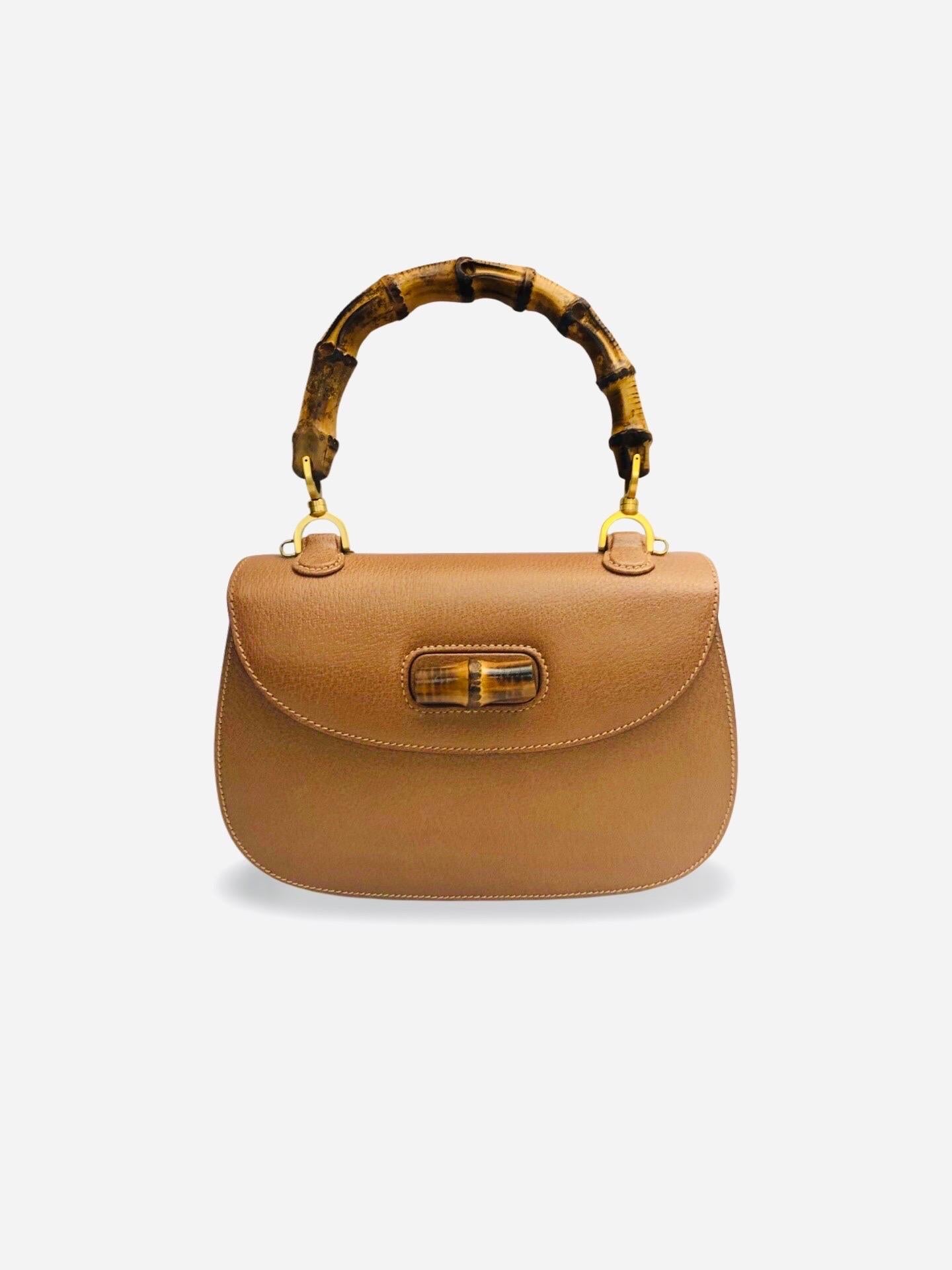 - Iconic and classic Gucci brown leather 1947 bamboo bag is an essential item in the closet. This bag is in excellent condition! 

- Convertible shoulder bag. 

- Comes with dust bag. 

- Length: 26cm. Height: 18cm. Width: 8cm. Strap length: 95cm.