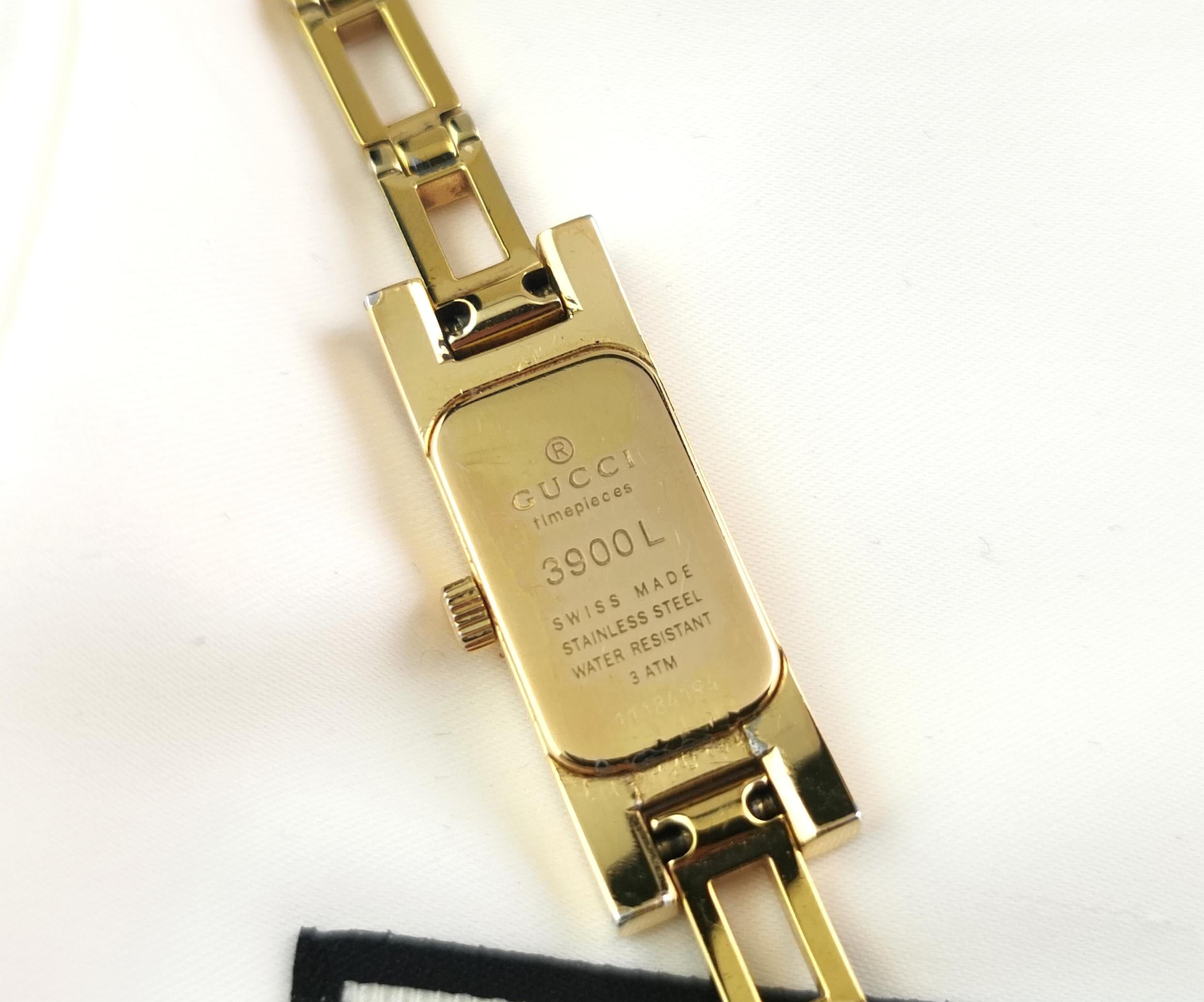 Gucci Damenarmbanduhr 3900l, vergoldet, im Karton  9