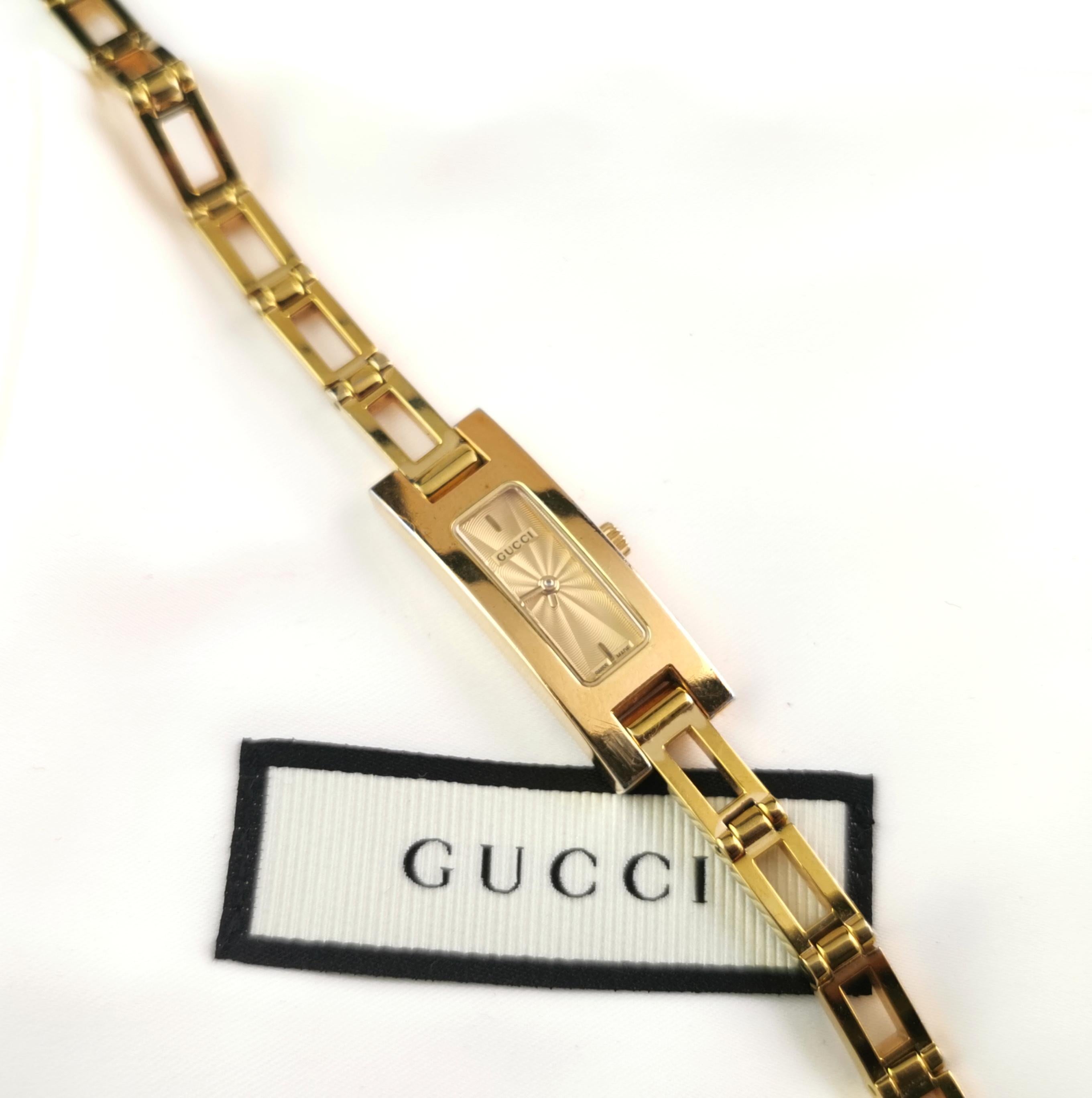 Gucci Damenarmbanduhr 3900l, vergoldet, im Karton  1