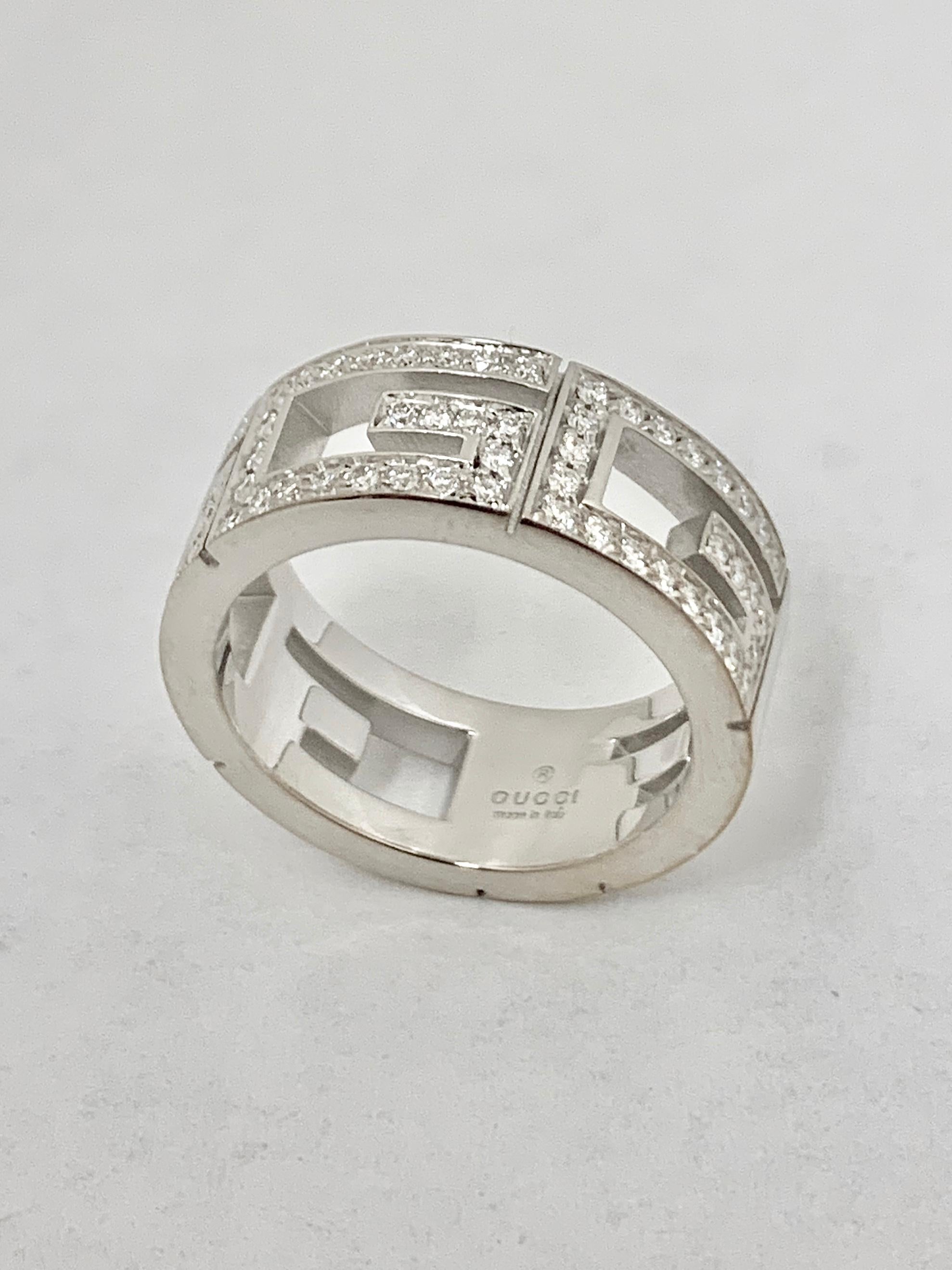 The Iconic 3G Logo ring by Gucci finely crafted in 18K white gold and set with fine round brilliant cut diamonds weighing 0.70 cts. total weight approximately.
Ring Size: 5
Stamp: Gucci , Made in Italy
Weight: 9 grams