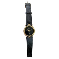 Gucci 4500m mens gold plated wristwatch, leather strap