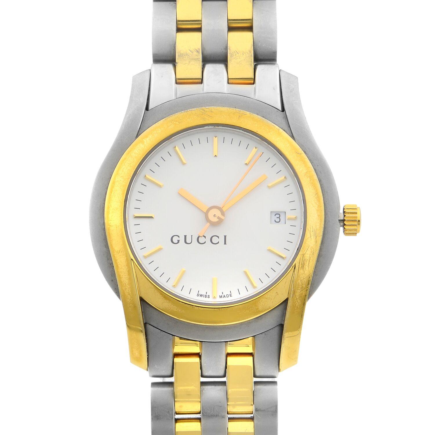 This pre-owned Gucci 5500L  YA055528 is a beautiful Ladies timepiece that is powered by a quartz movement which is cased in a stainless steel case. It has a round shape face, date dial and has hand sticks style markers. It is completed with a