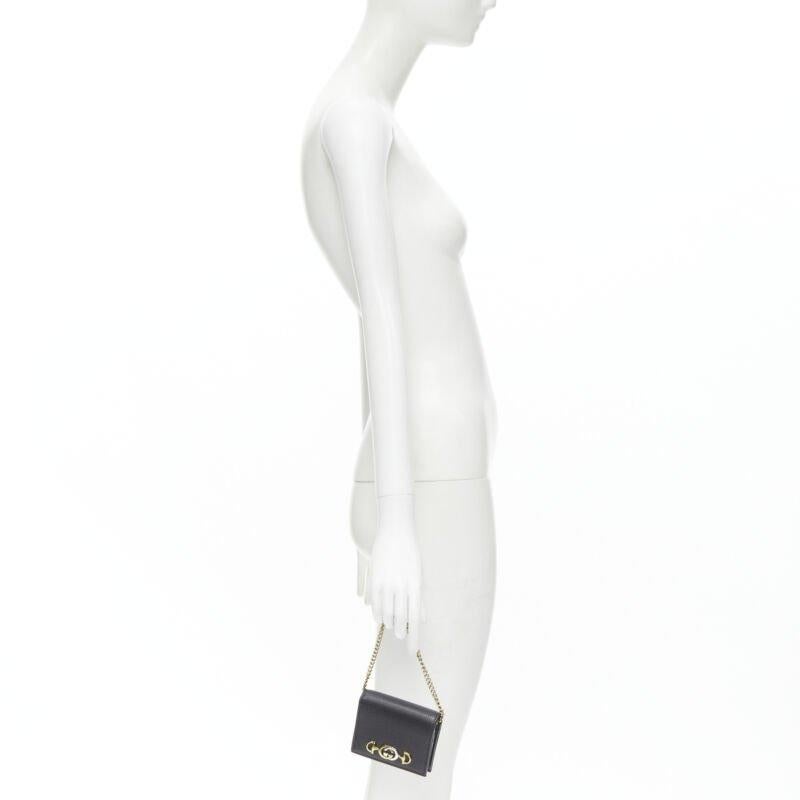 GUCCI 570660 Zumi black leather GG Horsebit bi-fold wallet on chain nano bag
Reference: TGAS/B02161
Brand: Gucci
Designer: Alessandro Michele
Model: 570660
Collection: Zumi
Material: Leather
Color: Black
Pattern: Solid
Closure: Button
Lining: 