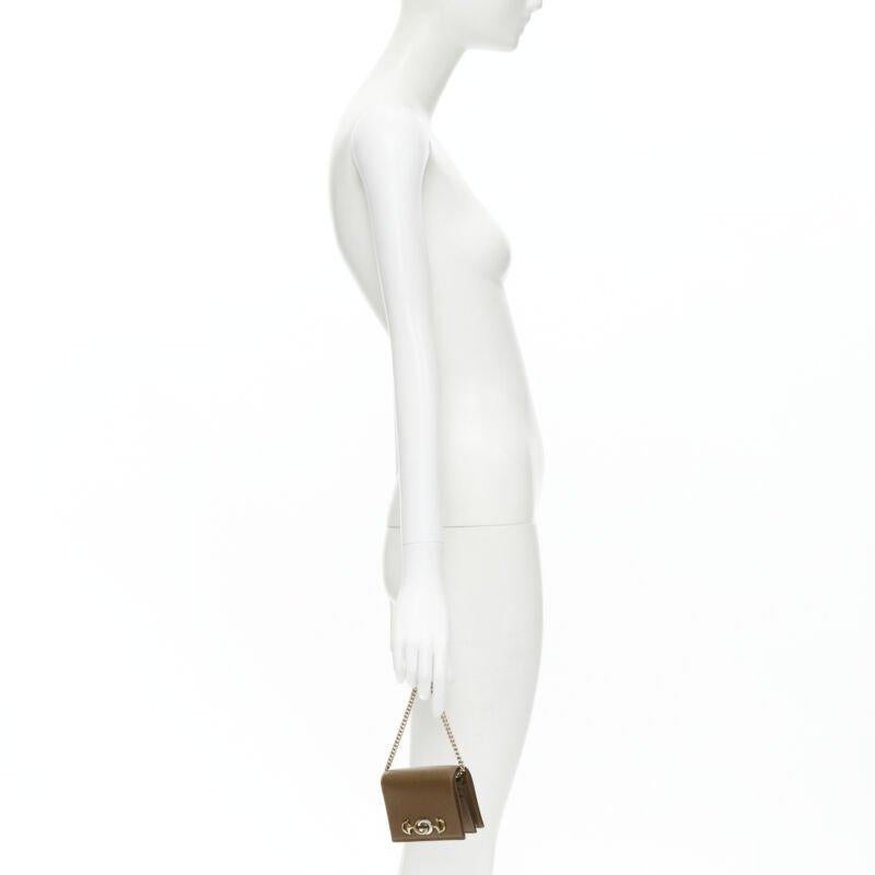 GUCCI 570660 Zumi brown leather GG Horsebit bi-fold wallet on chain nano bag
Reference: TGAS/B02162
Brand: Gucci
Designer: Alessandro Michele
Model: 570660
Collection: Zumi
Material: Leather
Color: Brown
Pattern: Solid
Closure: Button
Lining: 