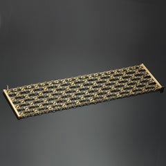 Breites Gliederarmband mit 7 Strängen G-Logo aus Gelbgoldkette von Gucci