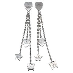 Boucles d'oreilles Gucci en argent 925 avec étoile et papillon en forme de cœur