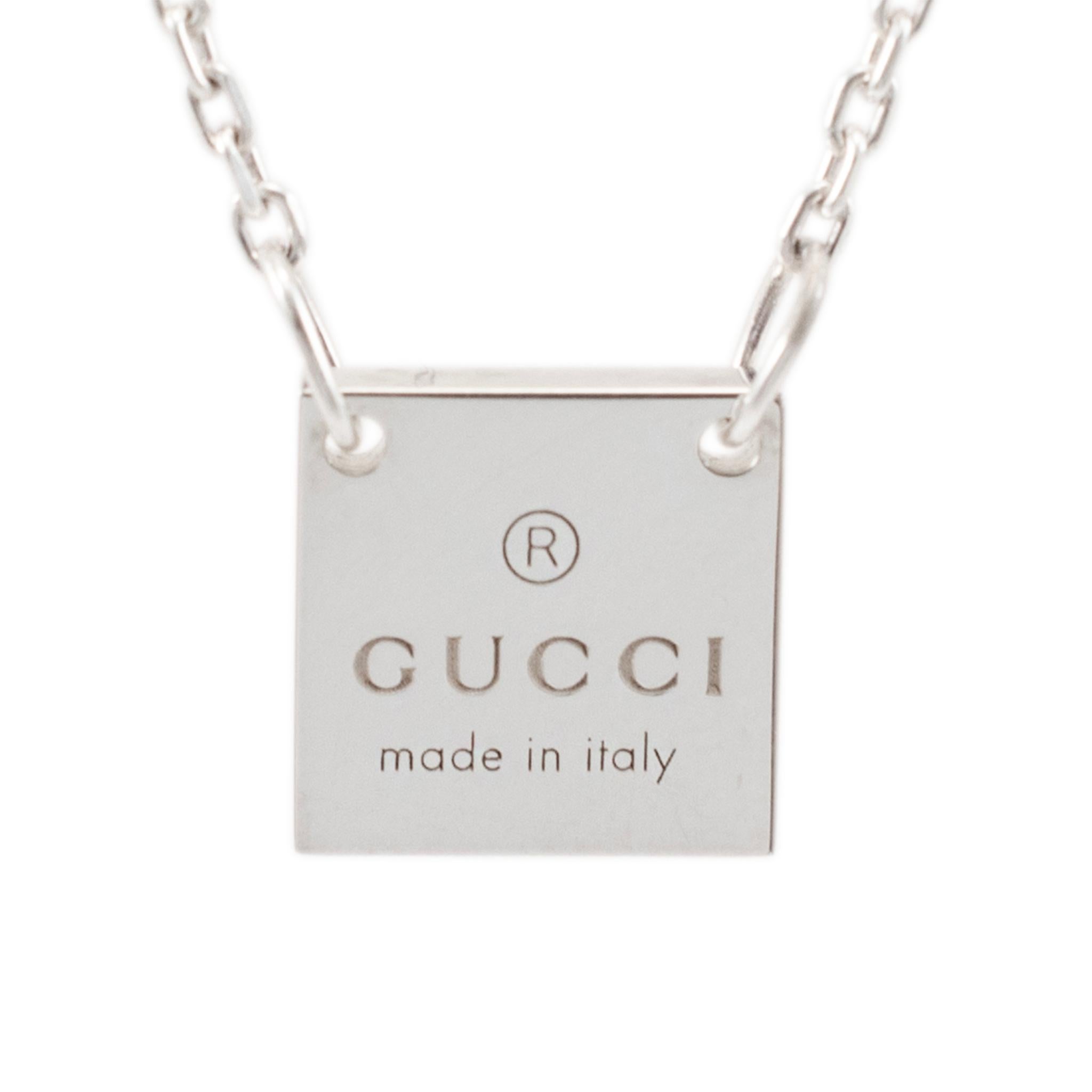 Brand: Gucci

Gender: Ladies

Metal Type: 925 Sterling Silver

Length:  18.00 inches 

Square Tag Measurements: 10.95 mm x 10.95 mm

Weight: 6.00 Grams

Silver necklace. The metal was tested and determined to be 925 (STERLING) silver. Engraved with