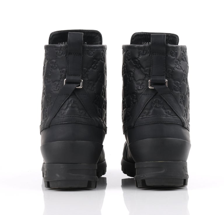 gucci combat boots with snake on bottom