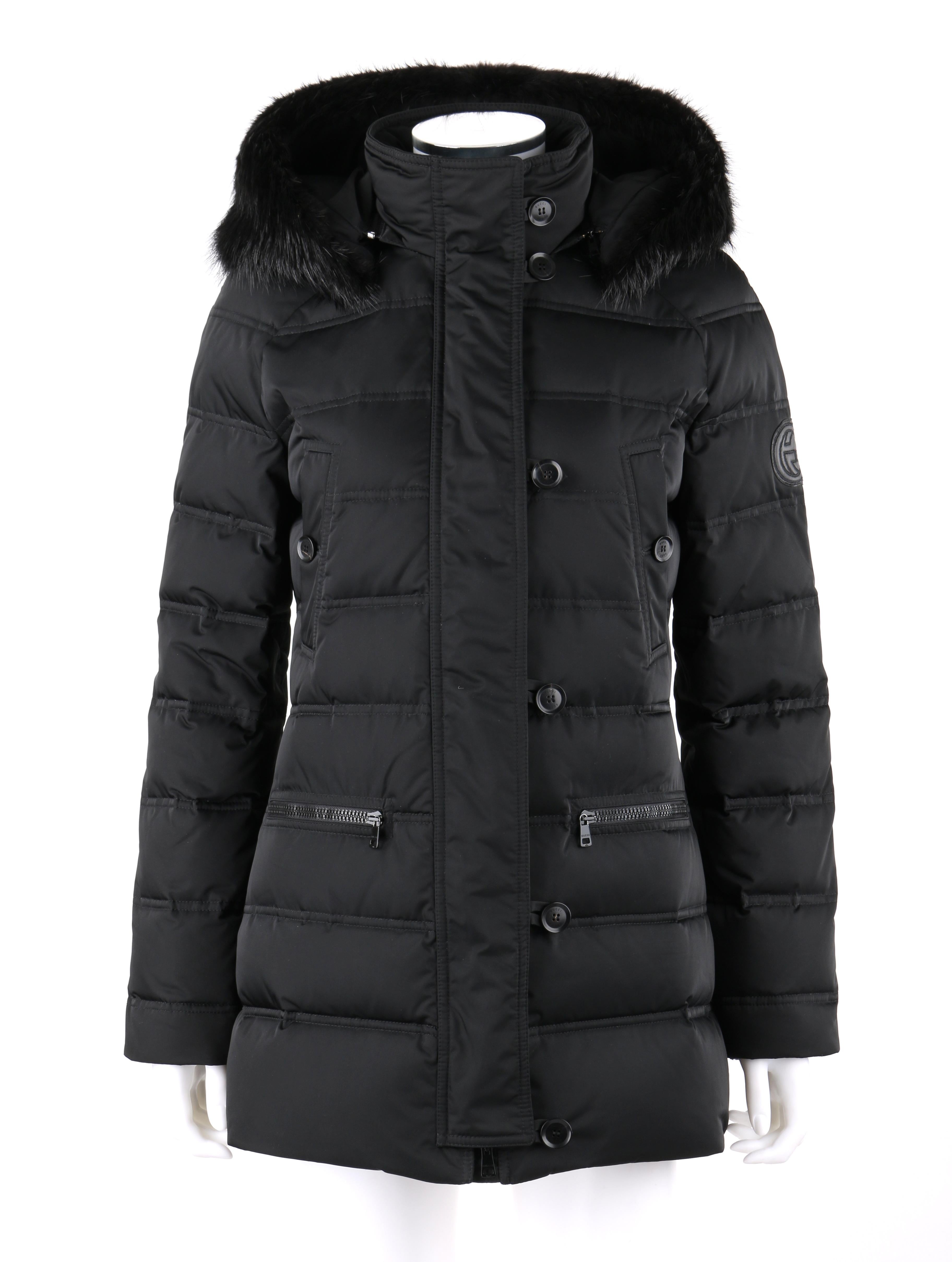 DESCRIPTION: GUCCI A/W 2013 Black Channel Quilted Beaver Fur Trim Hooded Down Puffer Coat
 
Estimated Retail: $3295
 
Brand / Manufacturer: Gucci
Collection: Autumn / Winter 2013
Designer: Frida Giannini
Style: Puffer coat
Color(s): Black
Lined: