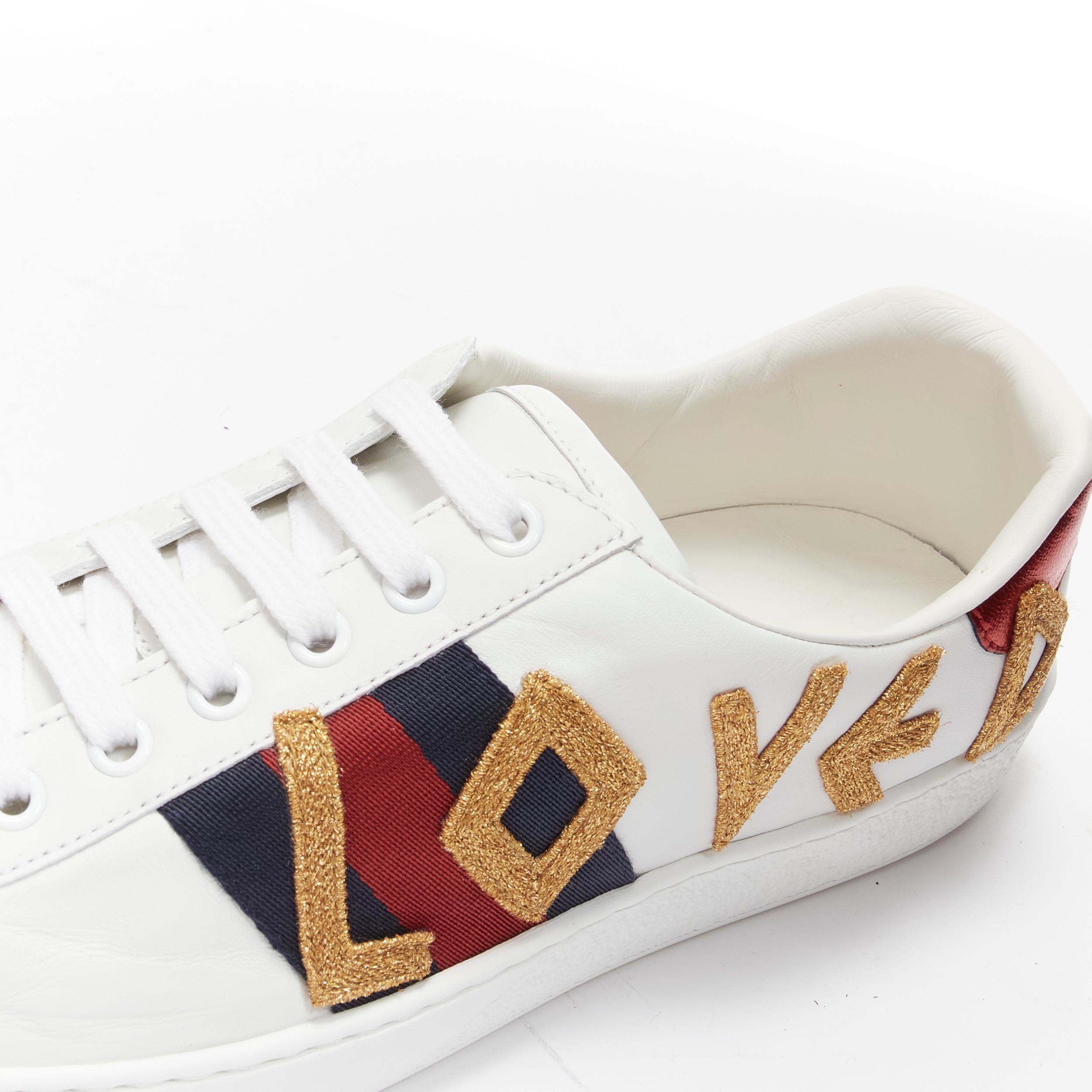 GUCCI Ace Loved gold embroidered blue red web leather sneakers UK7 EU41
Reference: TGAS/B02018
Brand: Gucci
Designer: Alessandro Michele
Model: 497090
Collection: Ace Loved
Material: Leather
Color: White
Pattern: Solid
Closure: Lace Up
Lining: