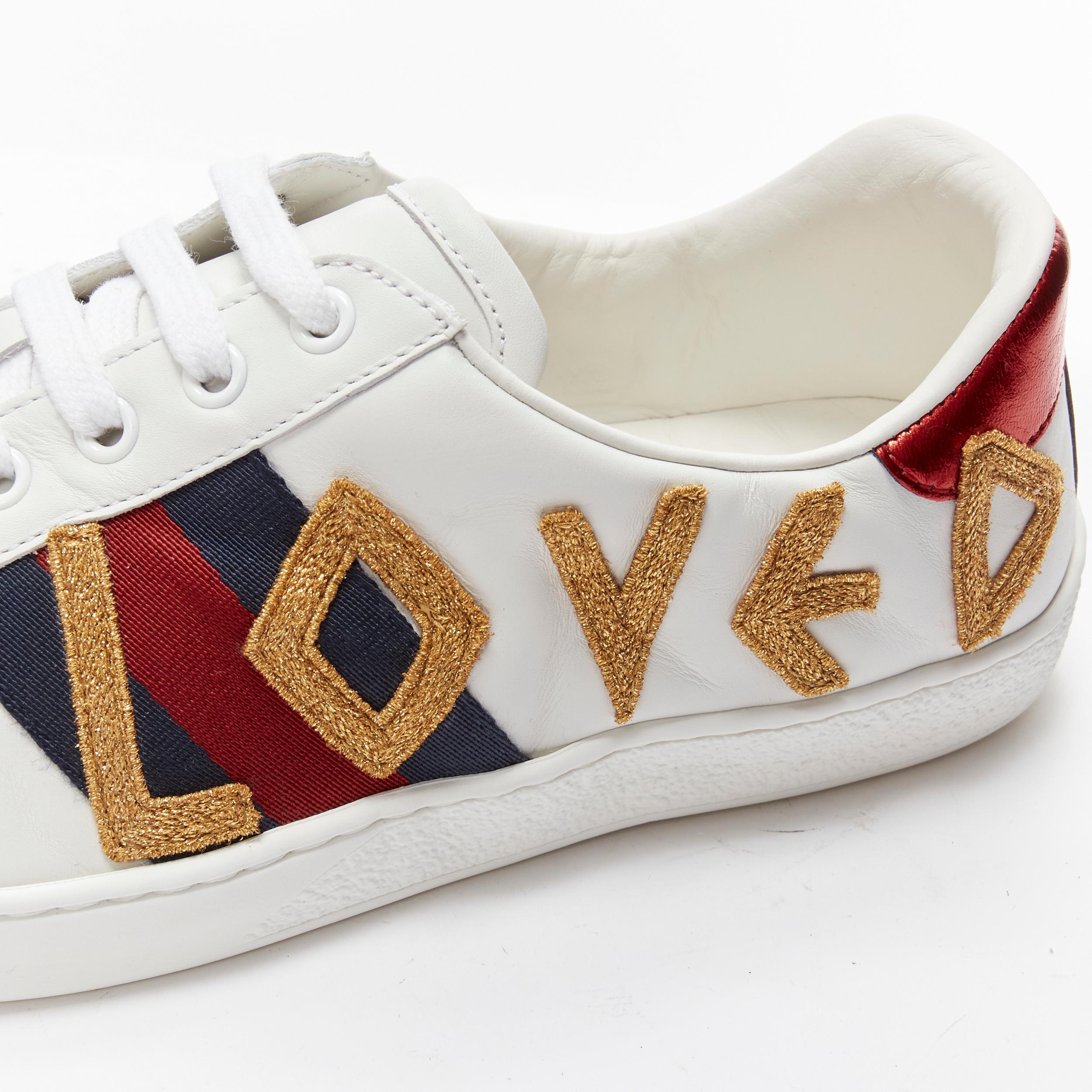 GUCCI Ace Loved gold embroidered blue red web leather sneakers UK8.5 EU42.5
Reference: TGAS/B02022
Brand: Gucci
Designer: Alessandro Michele
Model: 497090
Collection: Ace Loved
Material: Leather
Color: White
Pattern: Striped
Closure: Lace Up
Lining: