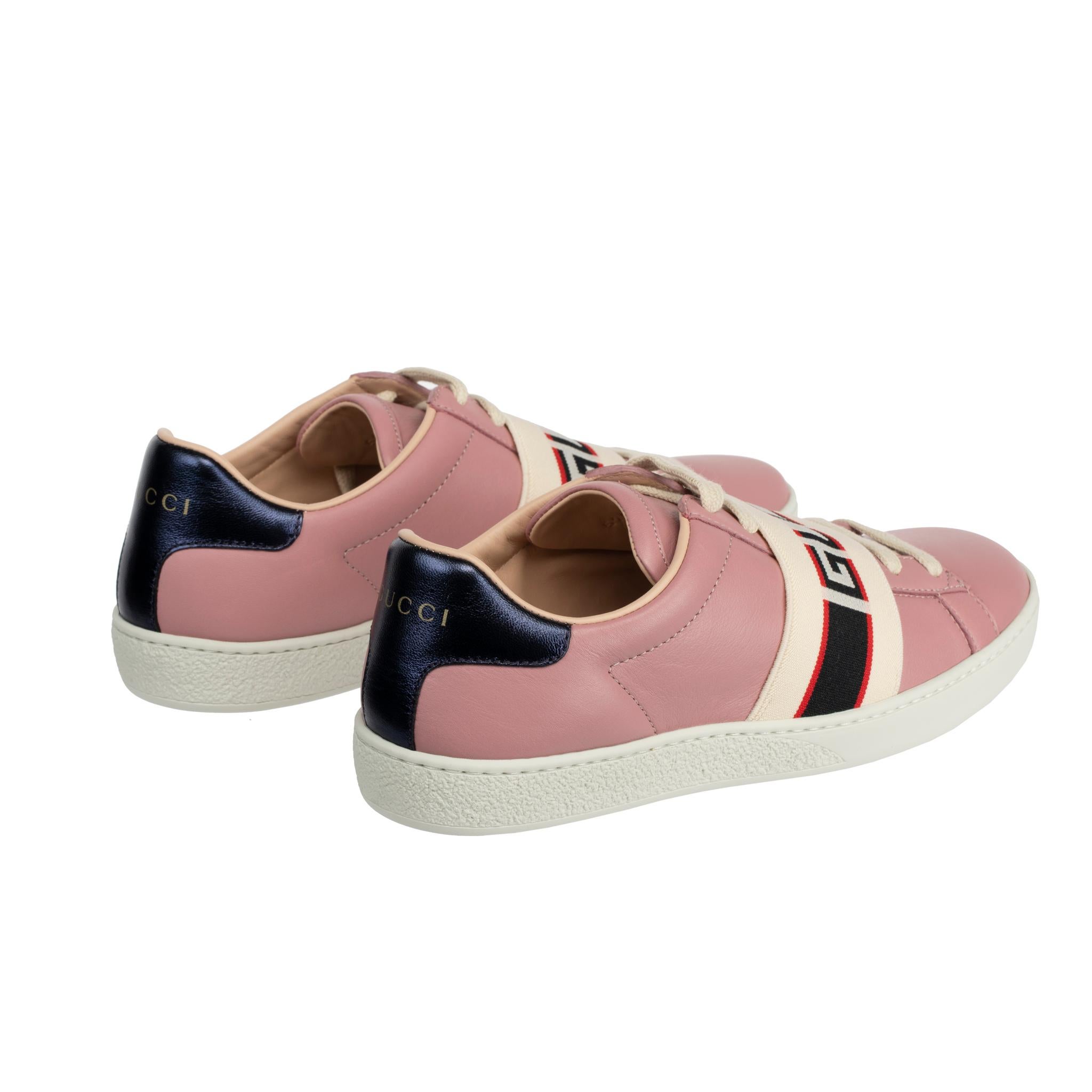 Gucci Ace Sneaker Dusty Pink & Metallic Blue 

Brand:

Cucci

Product:

Ace Sneakers With Gucci Logo Strap

Size:

35 It

Colour:

Dusty Pink & Metallic Blue

Material:

Smooth Leather

Condition:

Pristine; New Or Never Worn

Accompanied By:

Gucci