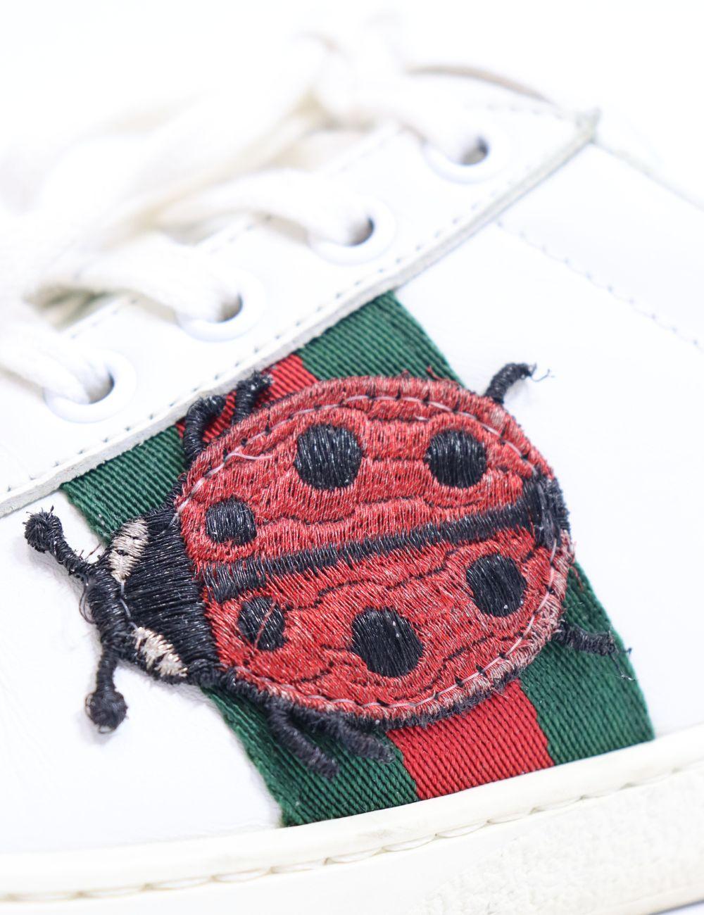 Gucci Ace Sneakers, features a round-toe, lace-up style, and low top.

Material: Leather
Size: EU 36
Overall Condition: Good
Interior Condition: Scuffing
Exterior Condition: Signs of use