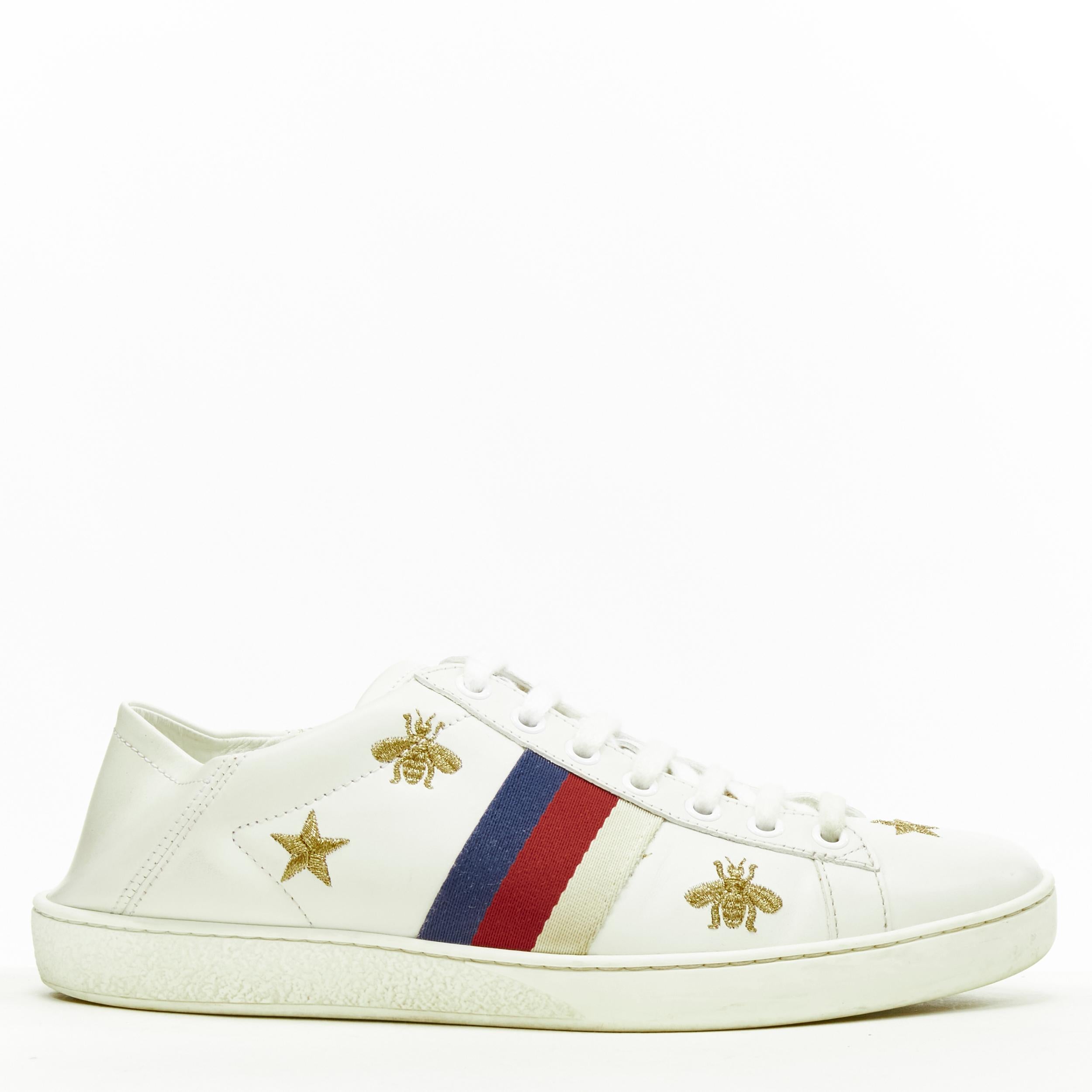 GUCCI Ace white leather gold Bee Star embroidery web step back sneaker EU37 US7 
Reference: LNKO/A01978 
Brand: Gucci 
Designer: Alessandro Michele 
Model: Ace sneaker 
Material: Leather 
Color: White 
Pattern: Multi 
Closure: Lace 
Extra Detail: