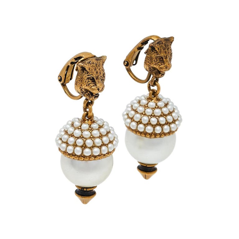 Gucci Aged Gold Tone Faux Pearl Feline Clip On Earrings at 1stDibs