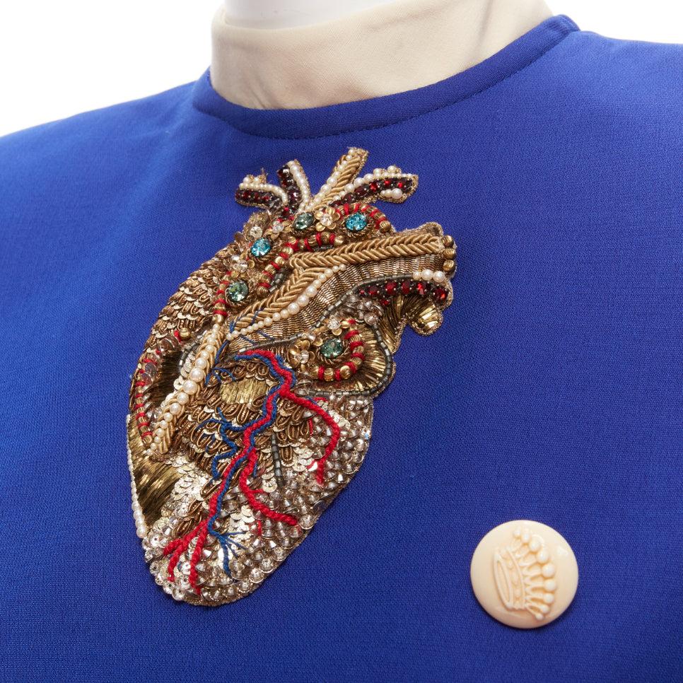 GUCCI Alessandro Michele 2018 blue Anatomical Heart applique cropped top IT38 M
Reference: TGAS/D00579
Brand: Gucci
Designer: Alessandro Michele
Collection: 2018
Material: Wool, Silk, Blend
Color: Blue, White
Pattern: Solid
Closure: Zip
Lining: Blue