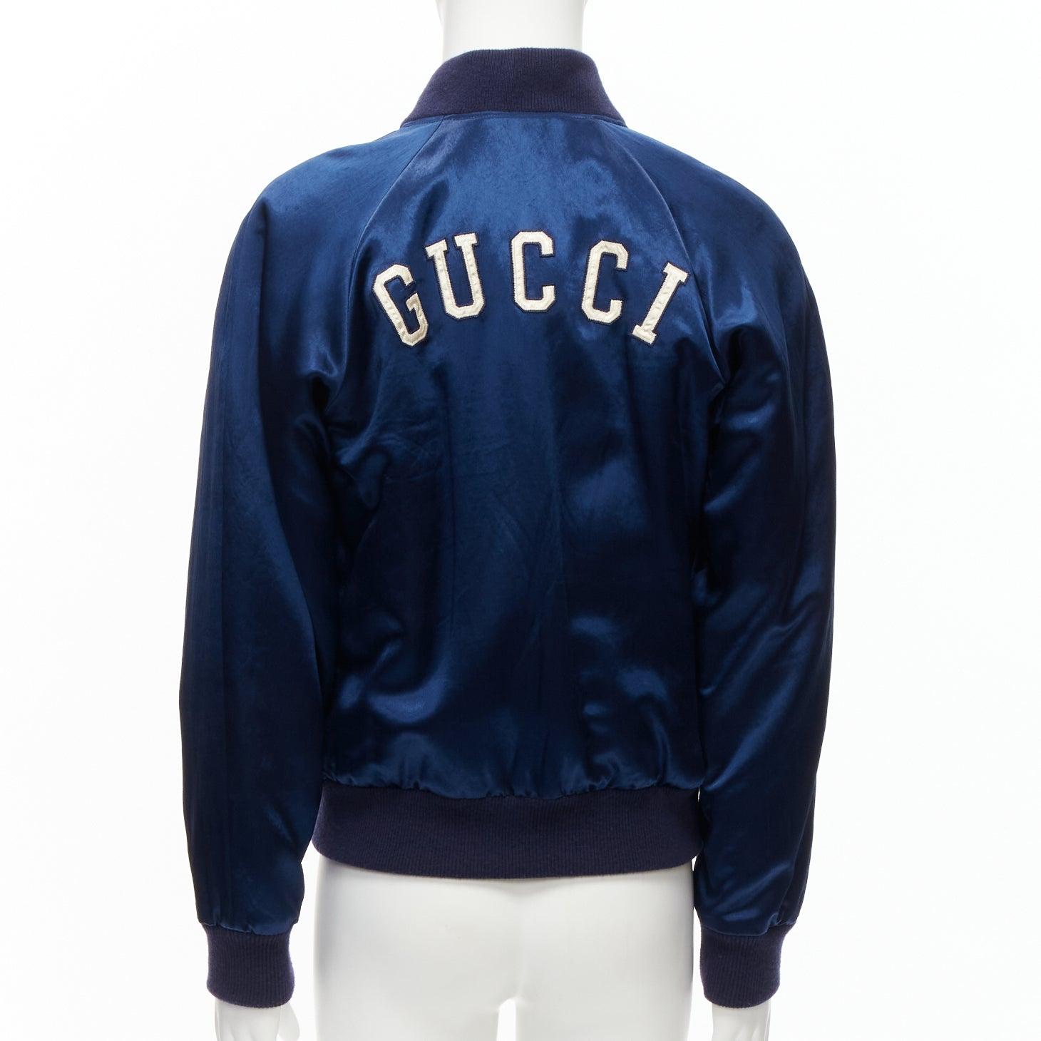 GUCCI Alessandro Michele 2018 NY Yankees embroidery satin baseball jacket IT48 M
Reference: JSLE/A00007
Brand: Gucci
Designer: Alessandro Michele
Collection: 2018 Yankees
Material: Acetate
Color: Navy, Off White
Pattern: Solid
Closure: Snap