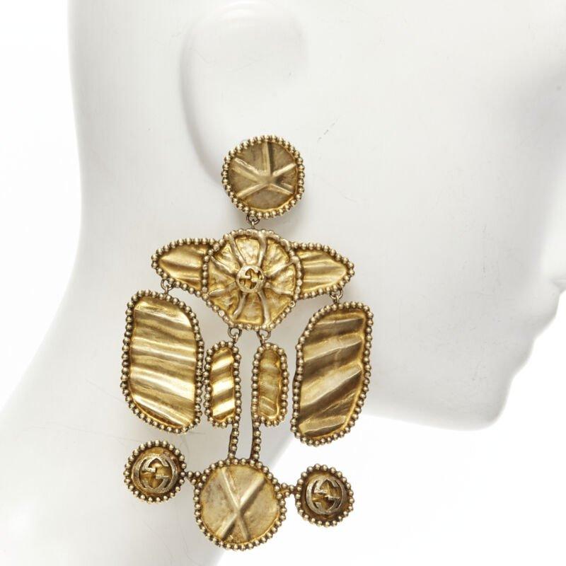 GUCCI ALESSANDRO MICHELE antique gold tone aboriginal tribal GG clip on earrings In New Condition In Hong Kong, NT