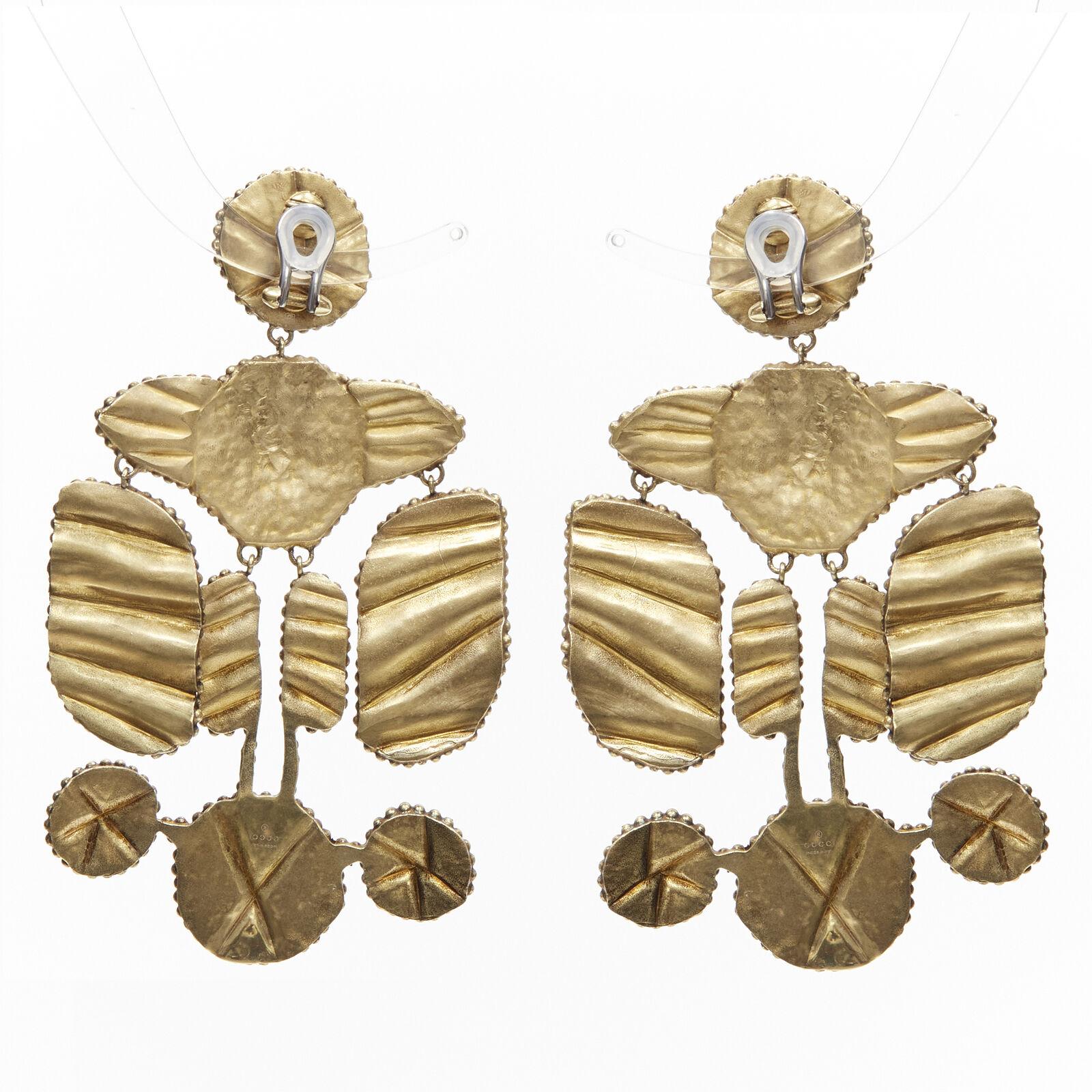 Women's GUCCI ALESSANDRO MICHELE antique gold tone aboriginal tribal GG clip on earrings